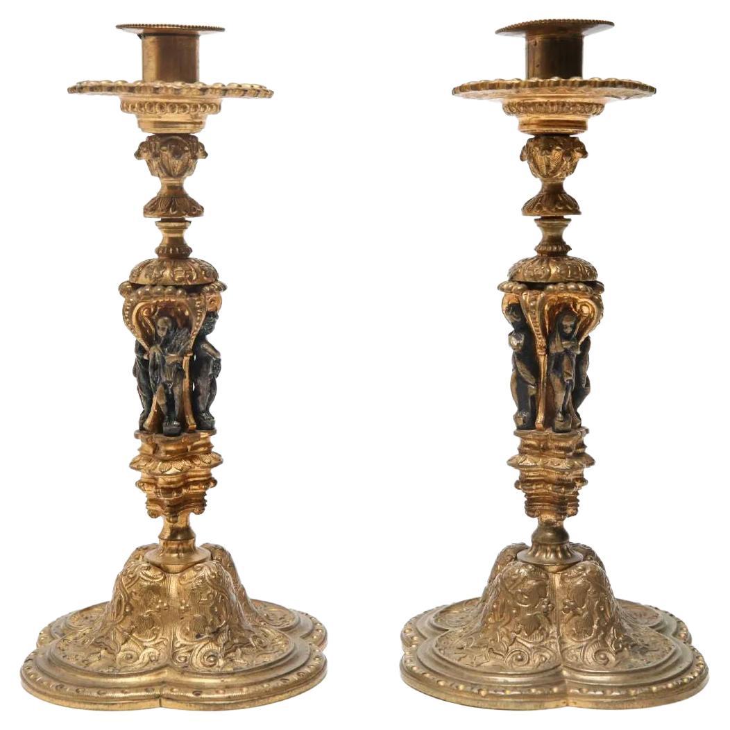 Paire de bougeoirs de style Louis XIV en bronze doré en vente