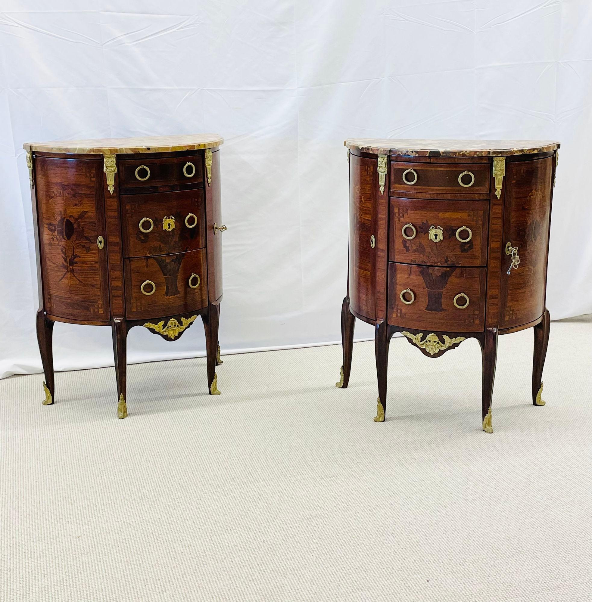 Pair of Fine Louis XV Demilune Side Tables, Nightstands, Commodes, Marble, Bronze Mounts
 
A stunning pair of  demilune end tables, nightstands or commodes having an inlaid floral theme on the front as well as the side panels. The pair with fine