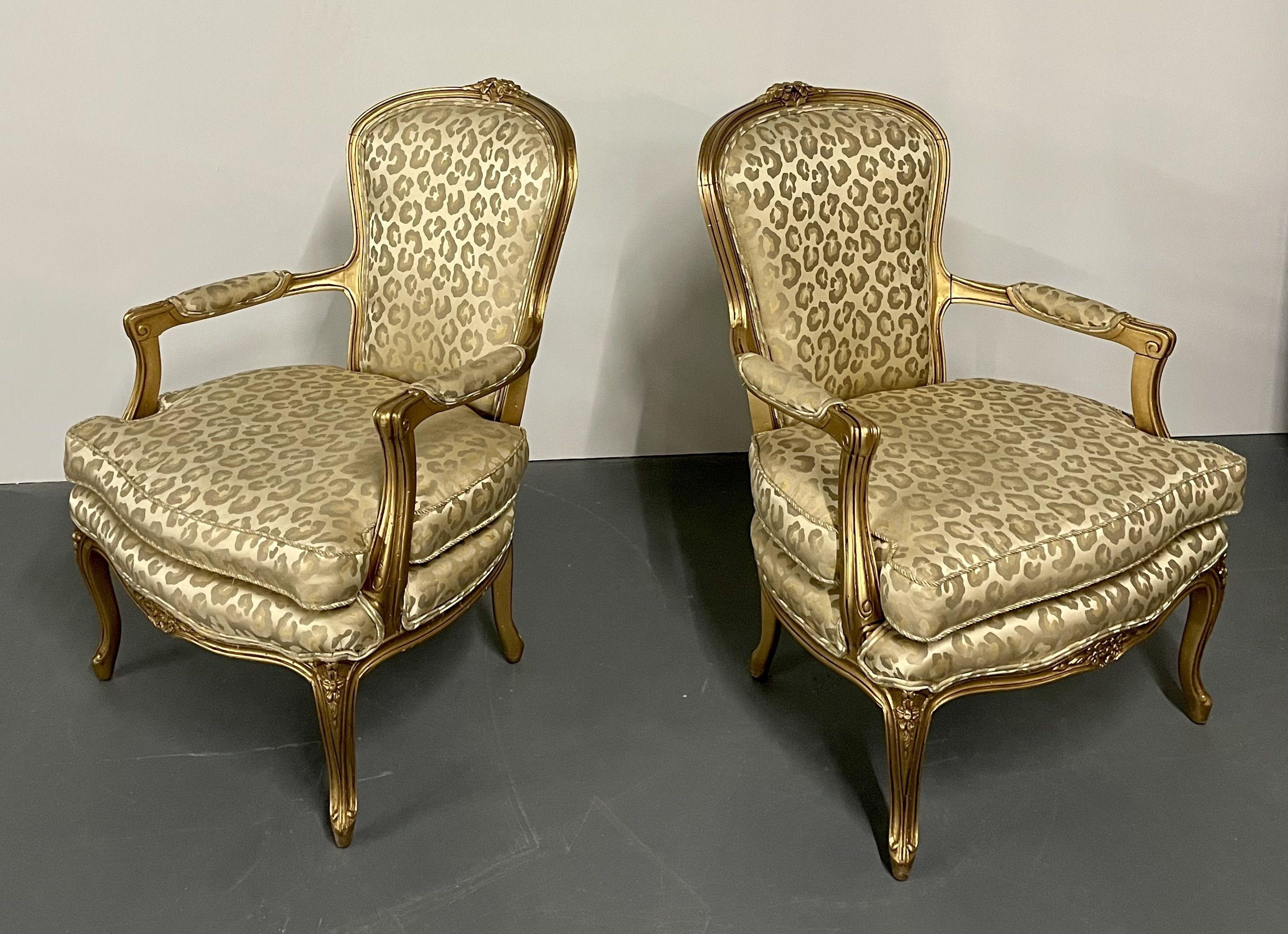 Pair Louis XV Fauteuil, gilt armchairs, Hollywood Regency, Leopard Textile

A finely carved and gilt wood pair of Arm chairs or Fauteuils. Each having a pillow top fully unholstered in a leopard upholstery. Dog, Drake, not included.

Measure: