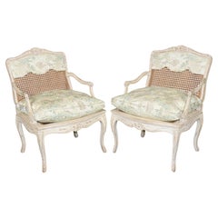 Pair Louis XV Style French Cream Distressed Painted Cane Back Armchairs