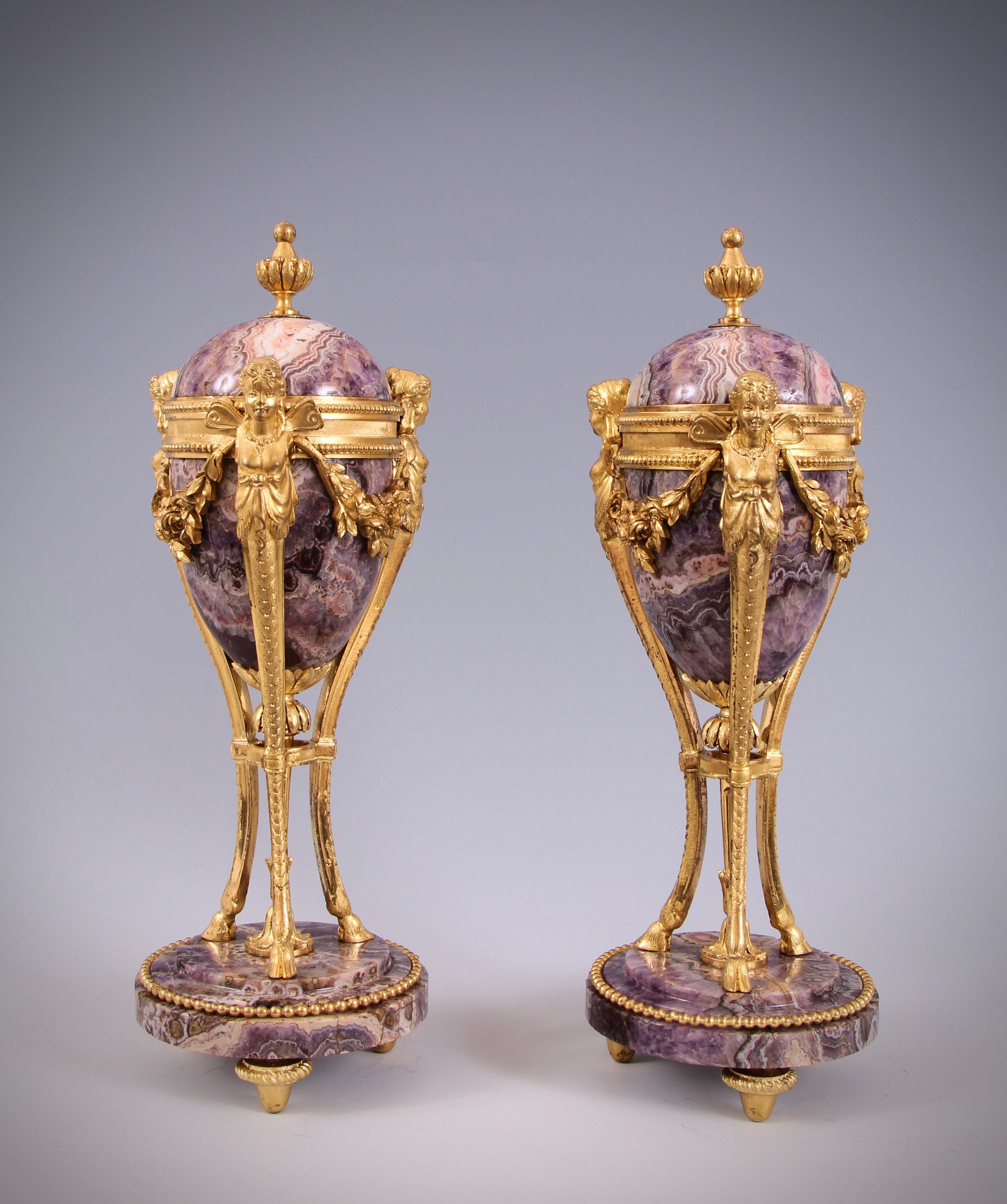 Sculpted from Amethyst, two of the most majestic, palatial and incredibly rare cassolettes created

Exceptionally rare pair of Louis XVI gilt bronze and Amethyst cassolettes.The rarity of this majestic pair cannot be overstated, they are without