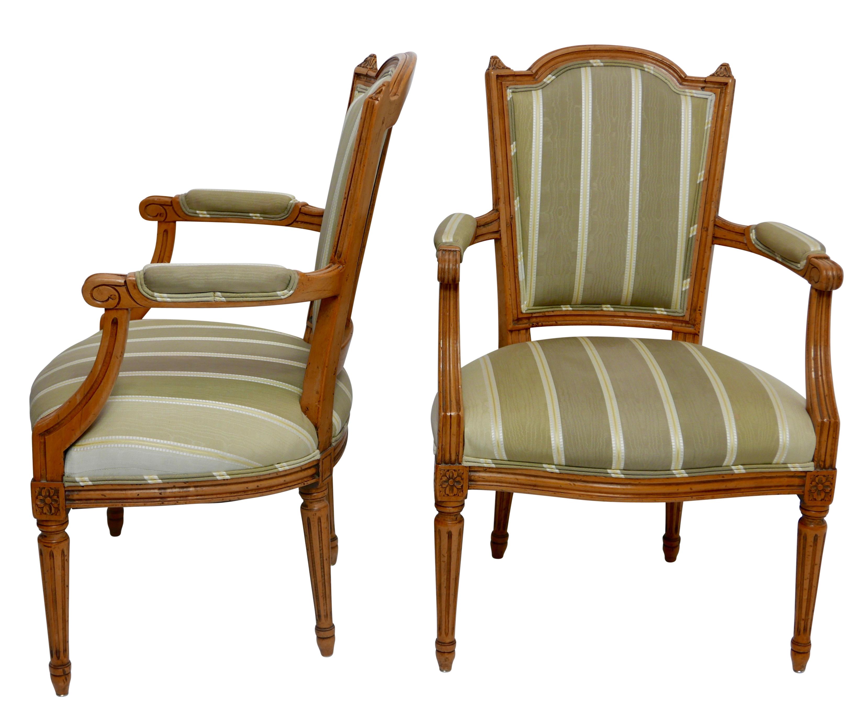 A pair of upholstered fruitwood Fauteuils armchairs with beautifully carved frames.
France, late 18th-early 19th century.
Recently refinished.