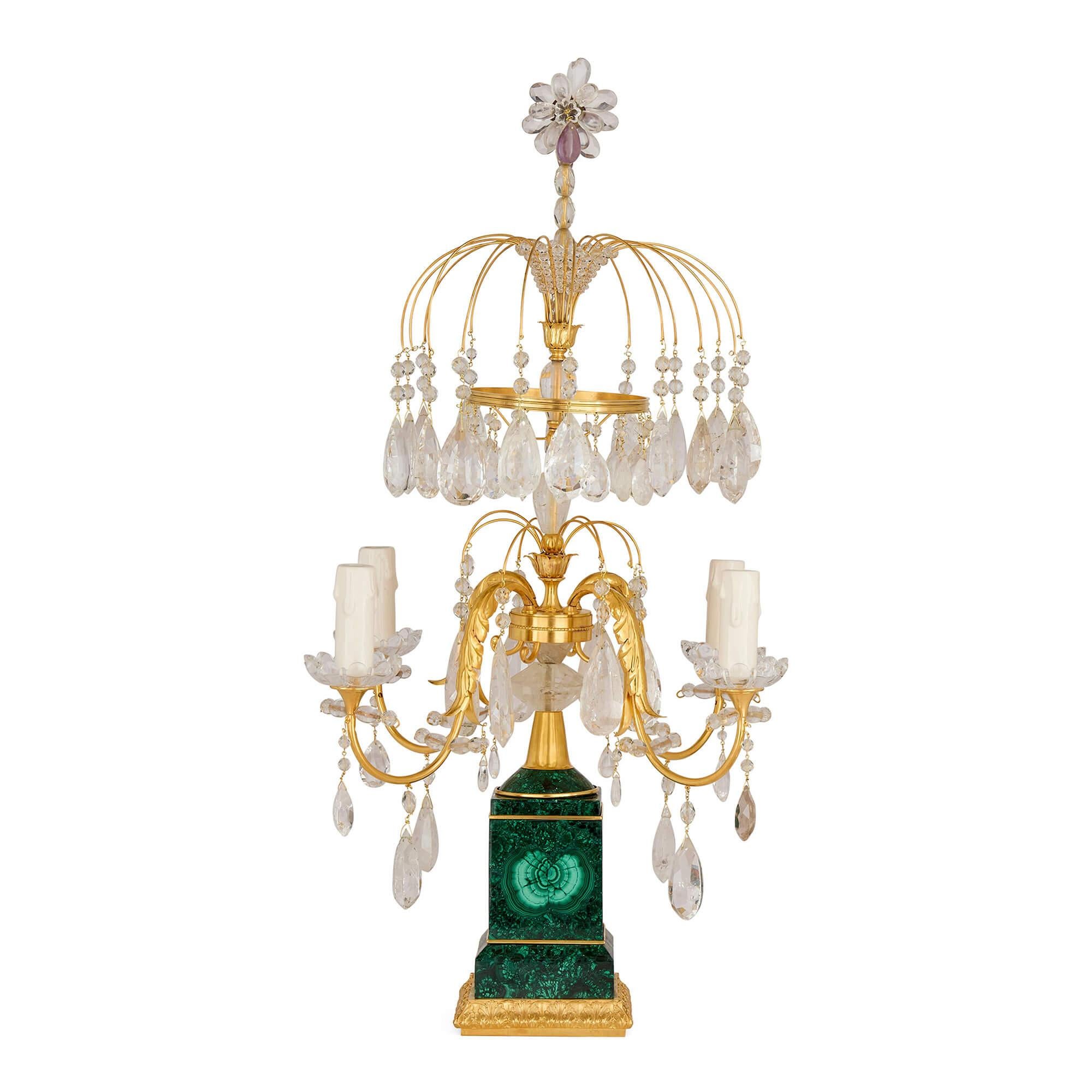 Paire de candélabres Louis XVI en bronze doré, malachite, améthyste, quartz et cristal de roche
Français, Début du 20e siècle 
Hauteur 92cm, largeur 43cm, profondeur 43cm

Cette exquise paire de girandoles, datant du début des années 1900, présente