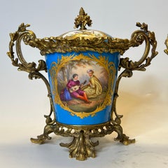Pair Louis XVI Sevres Style Bronze Mounted Porcelain covered Cachepots