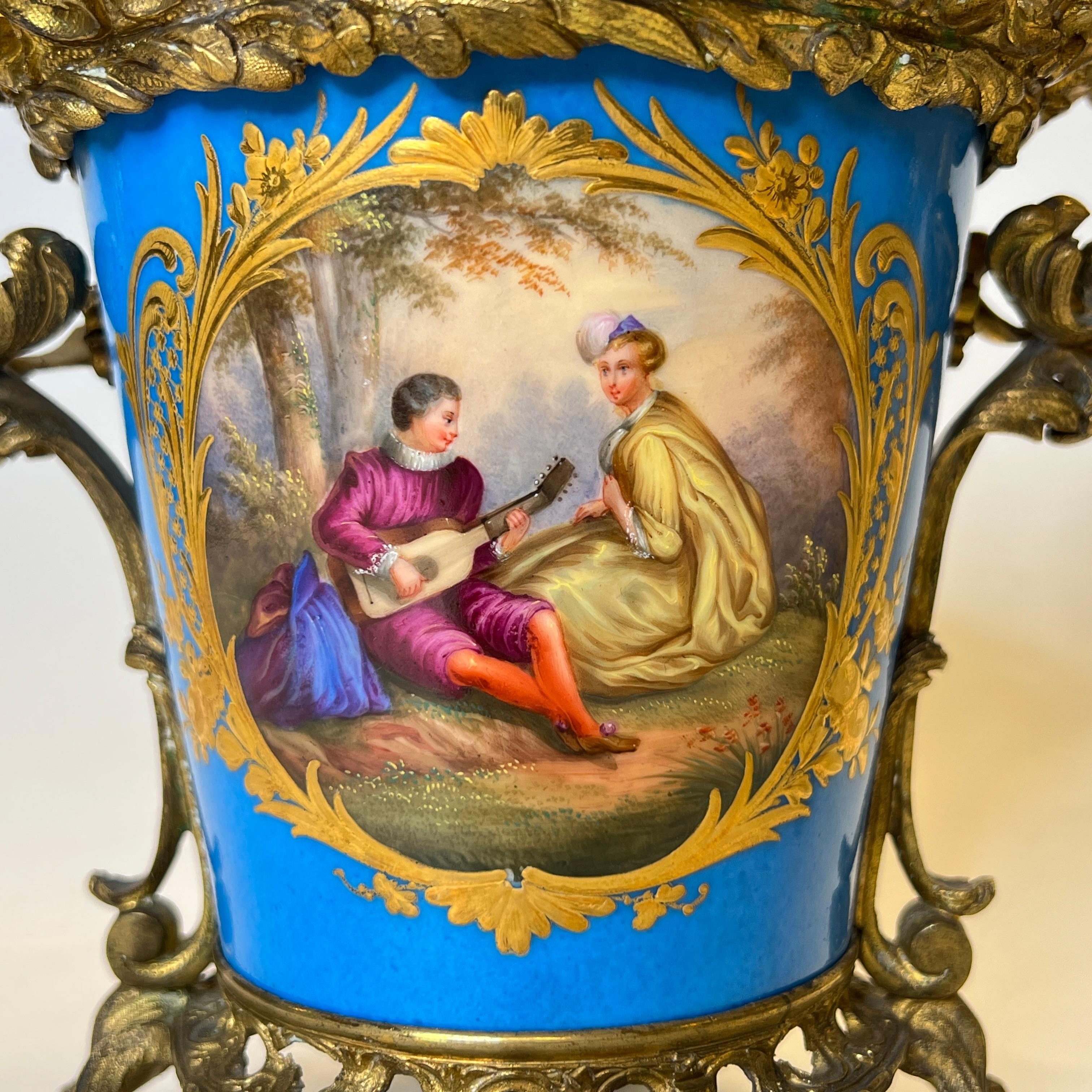 French Pair Louis XVI Sevres Style Bronze Mounted Porcelain covered Cachepots