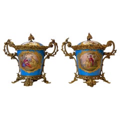 Pair Louis XVI Sevres Style Bronze Mounted Porcelain covered Cachepots