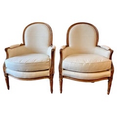 Paire de bergères de style Louis XVI
