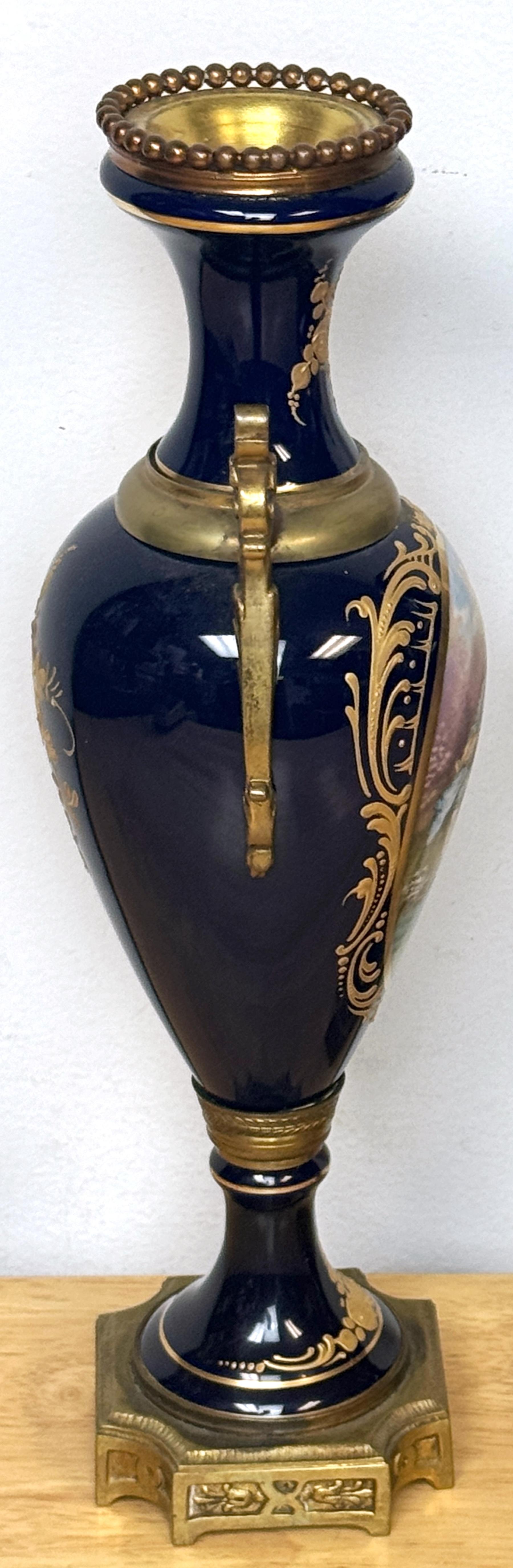 Dipinto a mano Pair Louis XVI Style Cobalt  Sevres Style Ormolu Mounted Vases in vendita