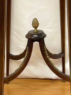 Pair Louis XVI style ormolu mounted stands with ram-head design and marble tops