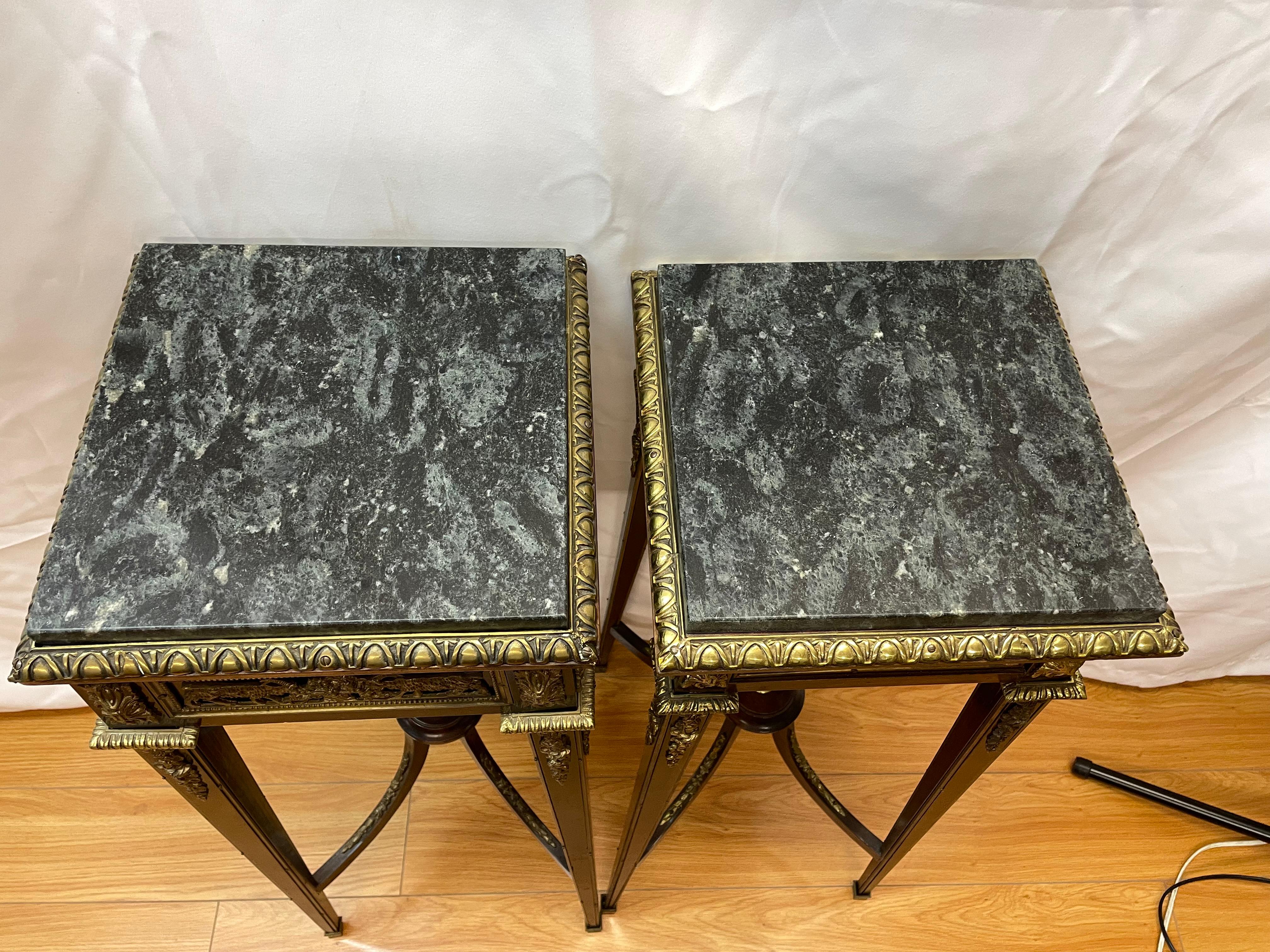 20th Century Pair Louis XVI style ormolu mounted stands with ram-head design and marble tops  For Sale