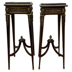 Pair Louis XVI style ormolu mounted stands with ram-head design and marble tops 