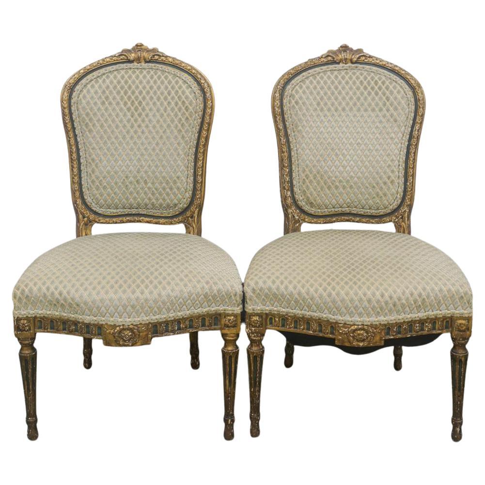 Pair of 19th Century Louis XVI Style Partial Gilt and Upholstered Accent Chairs with High quality upholstery. Re-upholstered in the 1980s.
