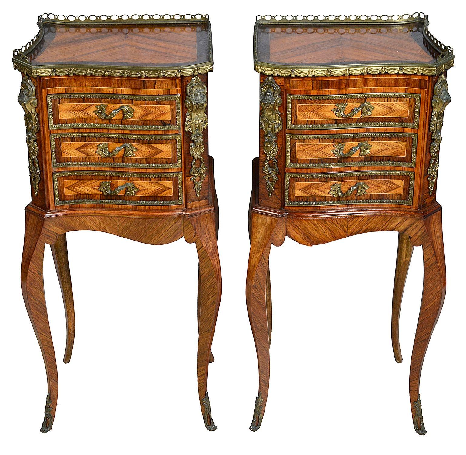A good quality pair of late 19th Century French Louis XVI style Kingwood side cabinets. Each with gilded ormolu galleries, mounts and handles. Serpentine front and sides, three herringbone veneered drawers and raised on elegant cabriole legs.

Circa