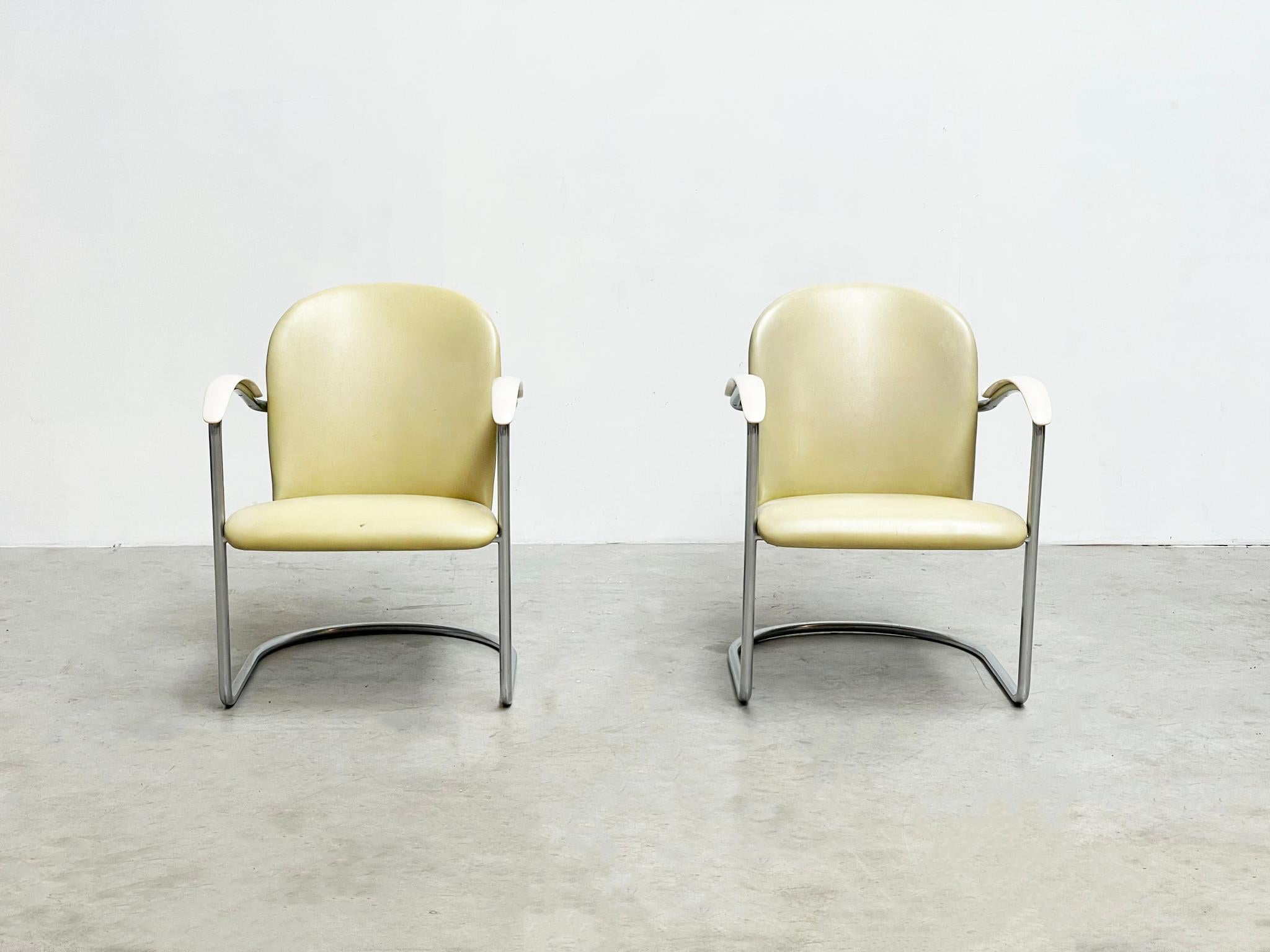  

Unique lounge chairs designed by famous designer WH Gispen for Gispen, Holland in 1937. These perticular chairs were custom-made for T.H. Delft in 1961, featuring rare white bakelite armrests and pastel yellow leatherette upholstery. Exceptional