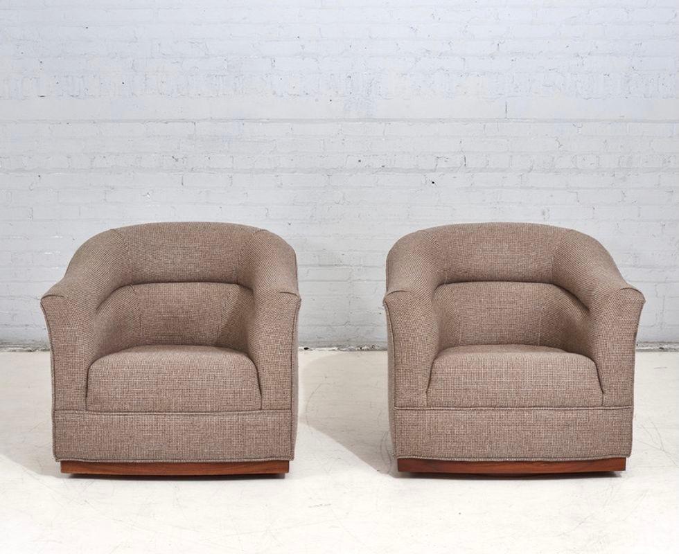 Pair lounge chairs w/walnut plinth base, 1960. Original upholstery in excellent condition. Bases have been restored. In the style of Ward Bennett.