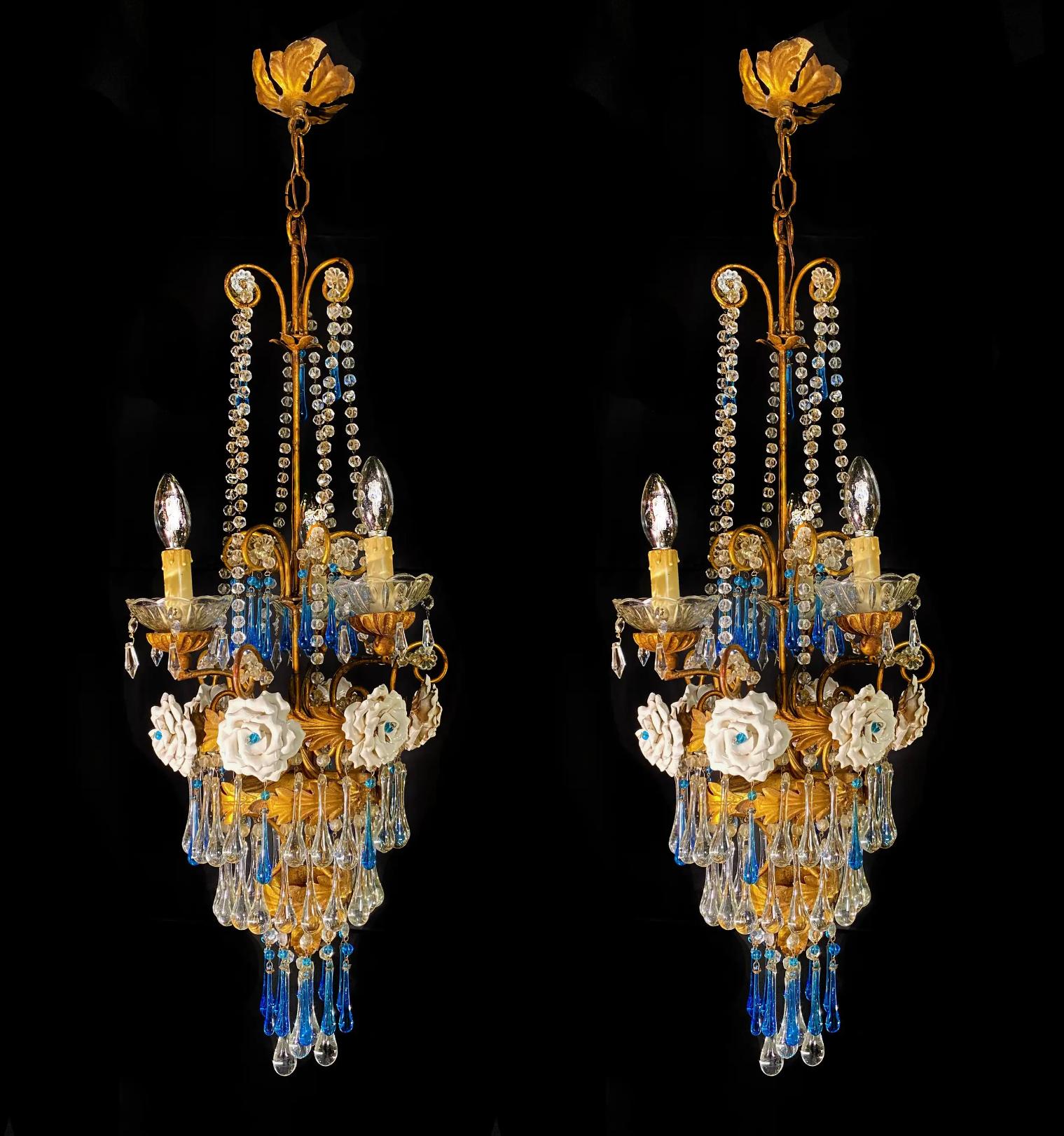 Pair Elegant Venetian chandeliers. Blue drops and 6 roses hang from the golden canopy. 3 small lights.
.  