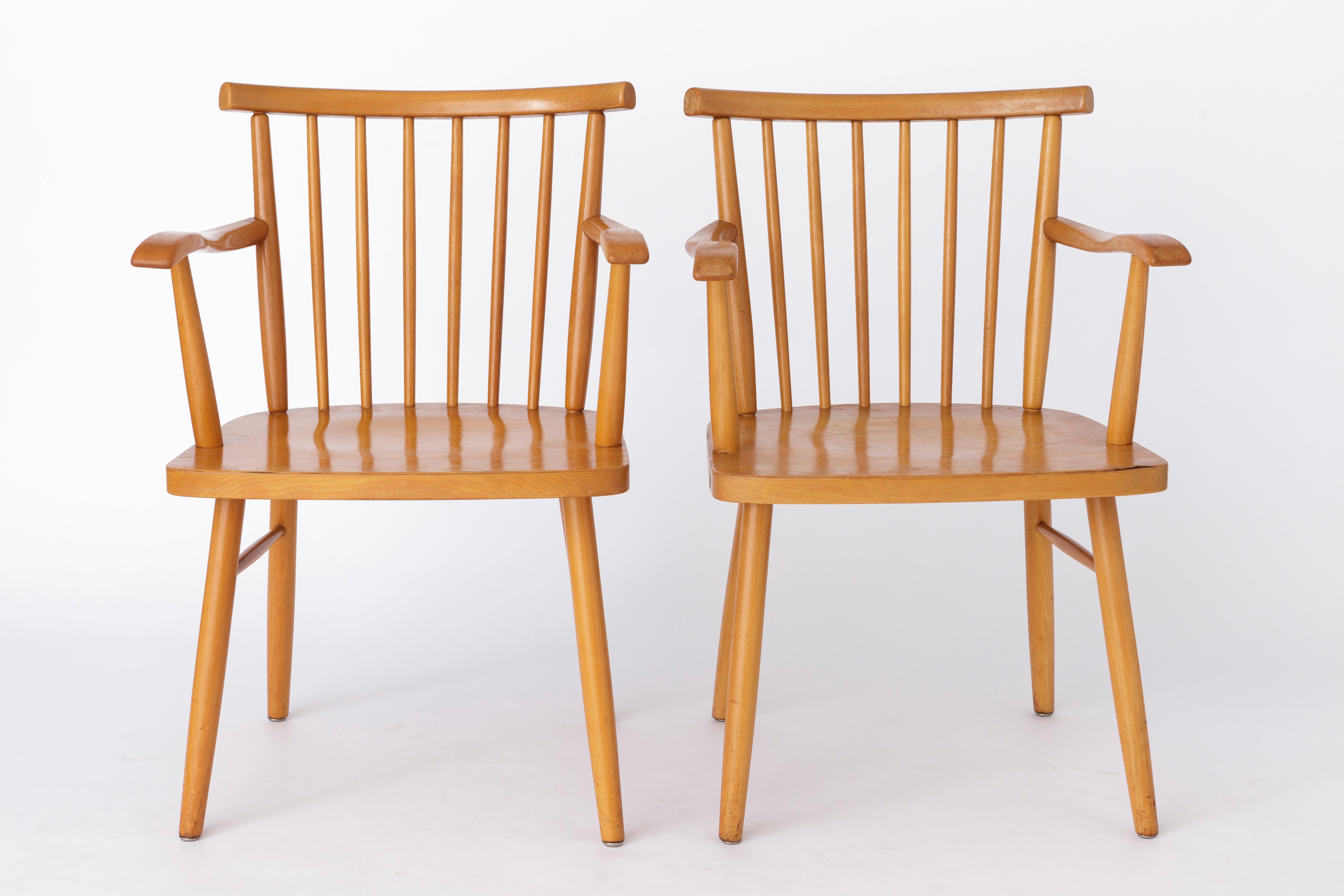 2 Vintage Armchairs from German manufacturer Lübke. 
Production period: 1950s. 
Displayed price is for 2 chairs. Totally up to 3 chairs + Bench available. 

Sturdy Beech wood frame. Refurbished and oiled. 
Manufacturer stamp under the seat. 