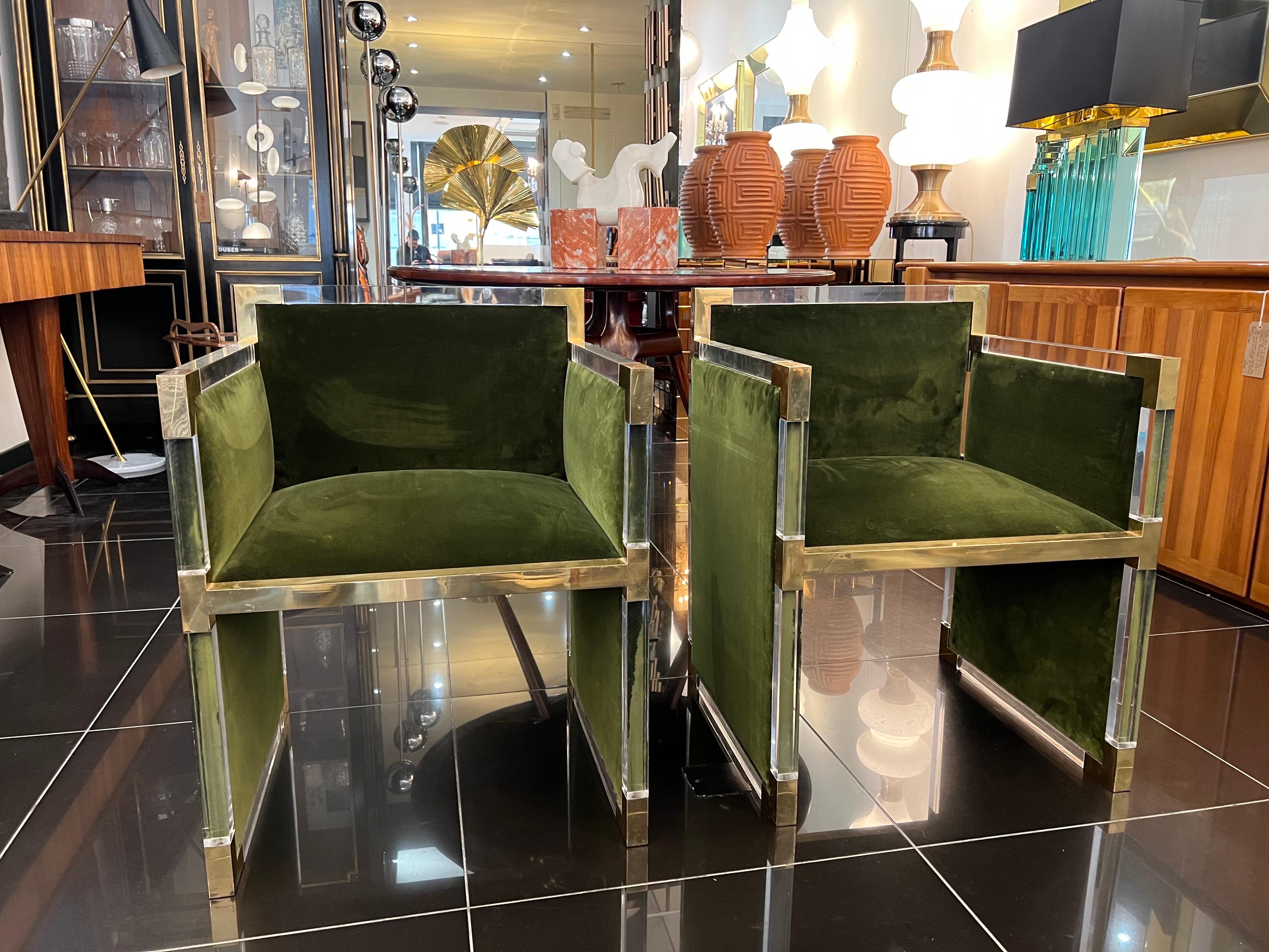 A beautiful pair of lucite and brass cubicle armchairs newly upholstered in striking green velvet by Rose uniacke . The chairs are of exceptional quality attributed to the work of Charles Hollis Jones . C1970 . USA