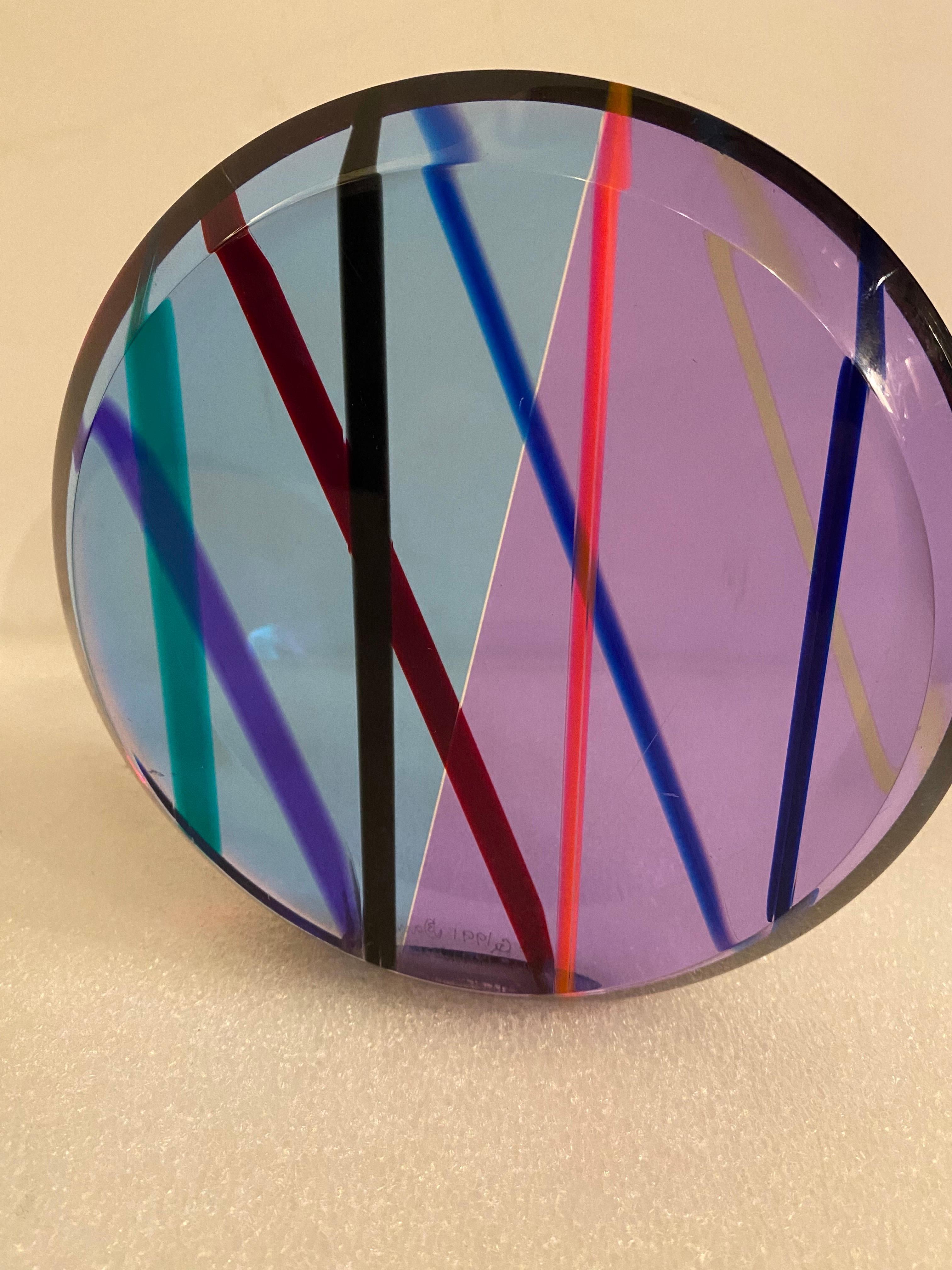 Pair of Lucite Sculptural Circles in the style of Charles Hollis Jones.  Nice colors of purples and blues.  Spheres are highly polished and in nice shape.  They are dated and signed, but name is hard to read.
