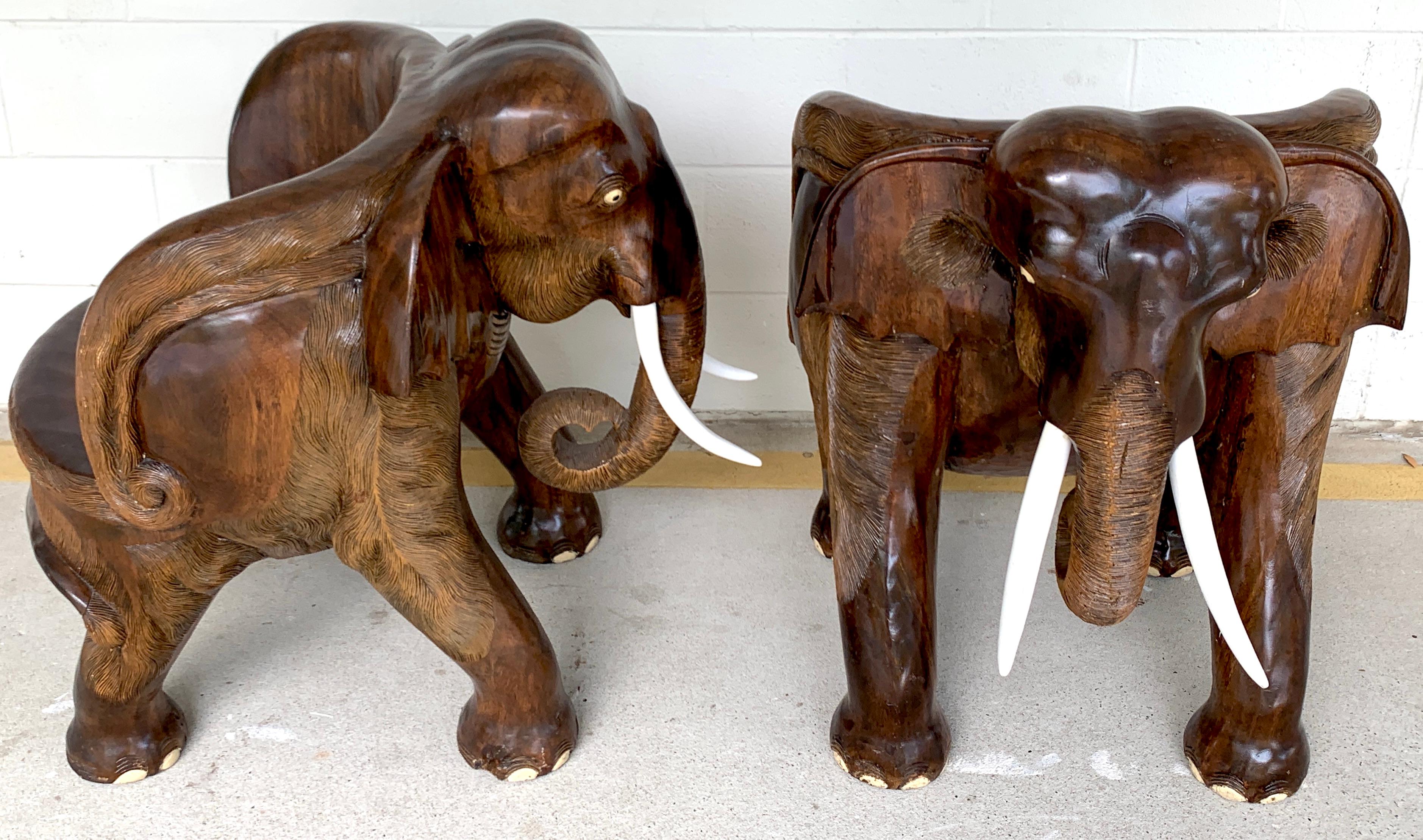 Wood Pair of Magnificent of Late 19th Century Hardwood Carved Elephant Chairs For Sale