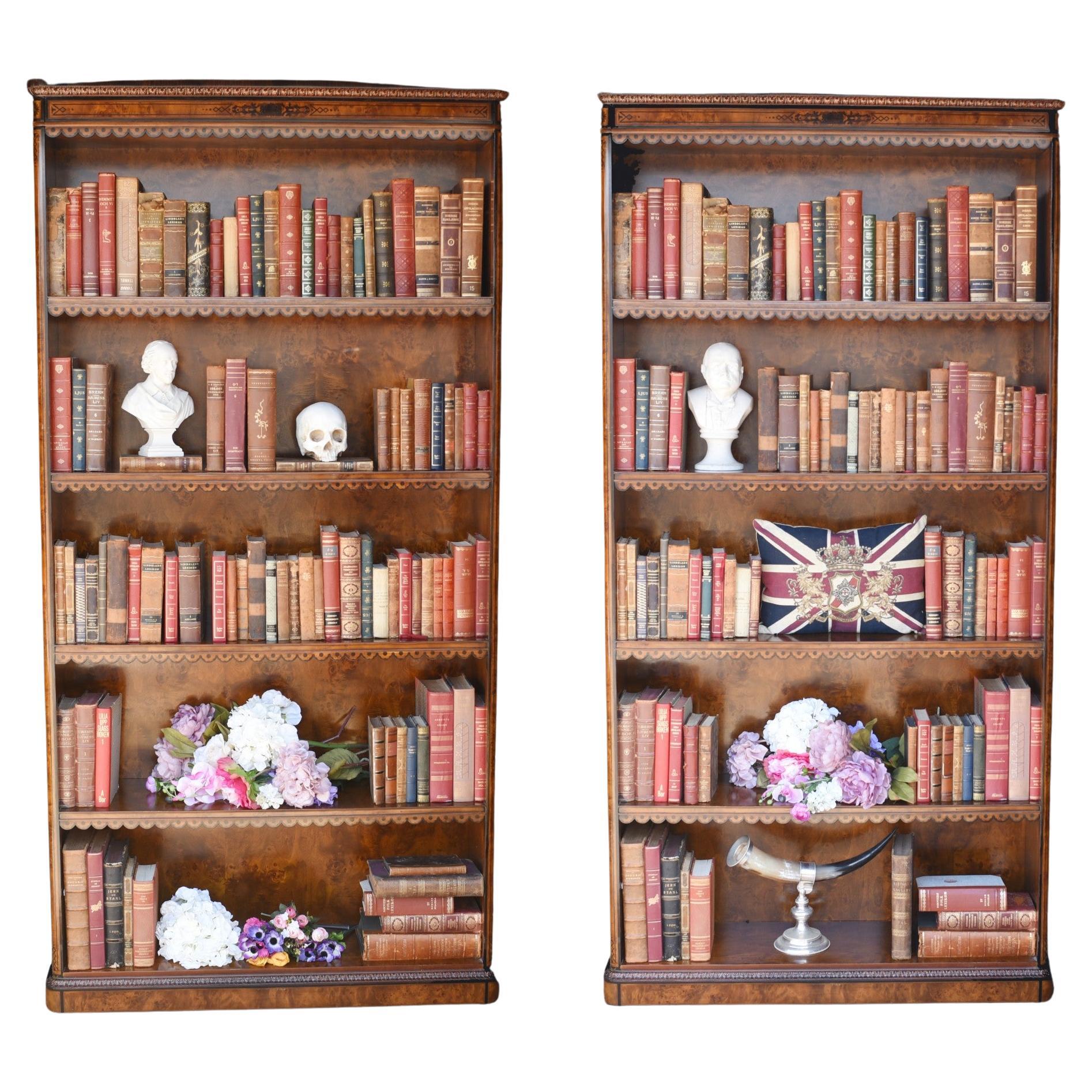 You are looking at a pair of English Sheraton style openfront bookcases hand crafted from the finest mahogany. This lovely pair are the perfect mix of decorative beauty and practical functionality to make for a vintage design classic. They look