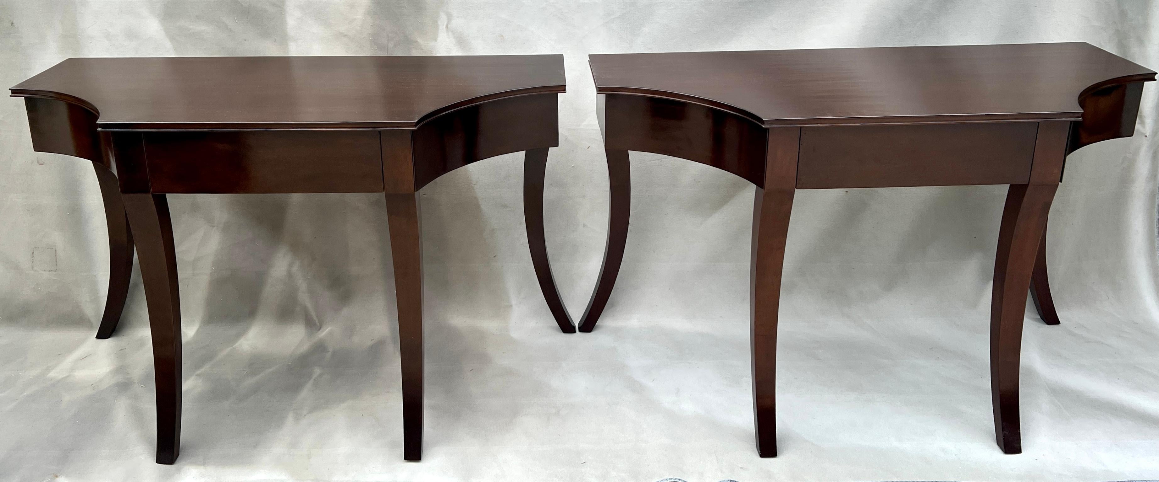 Pair of Rose Tarlow Melrose House Mahogany Keats Console Tables.

The Tables are a beautiful example of the Iconic Designers exquisite design and fabrication.  The pair are beautifully finished and have three very large and useful drawers on each