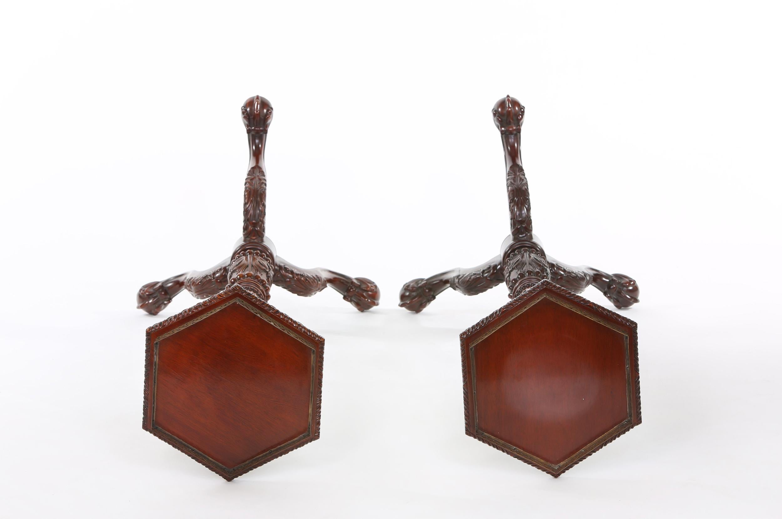 Pair of mahogany wood with brass gallery top tray pedestal tables. Each table is very sturdy and in good condition. Minor wear consistent with age / use. Each pedestal stands about 50 inches tall x 11.5 inches diameter.