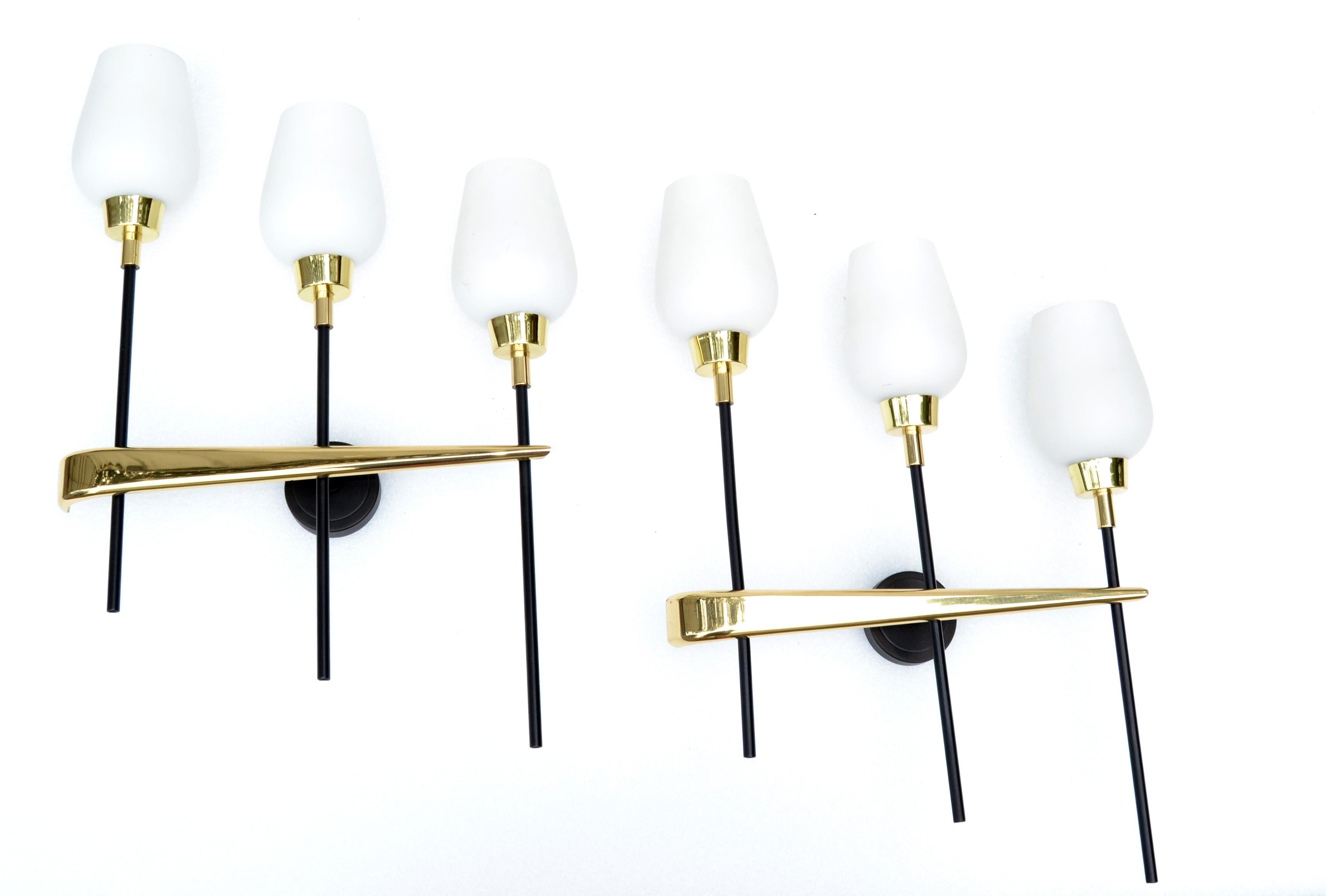 Polished Pair Maison Arlus Brass, Steel 3-Light Wall Sconces & Cone Opaline Glass Shade For Sale