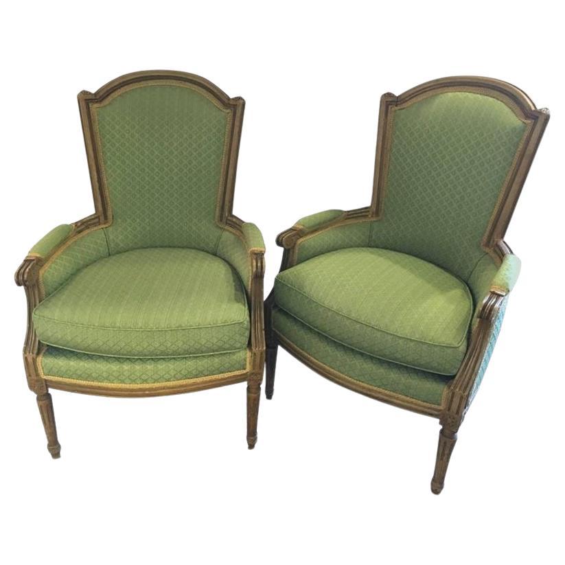 Paire de chaises bergères de style Louis XVI estampillées Maison Jansen, France