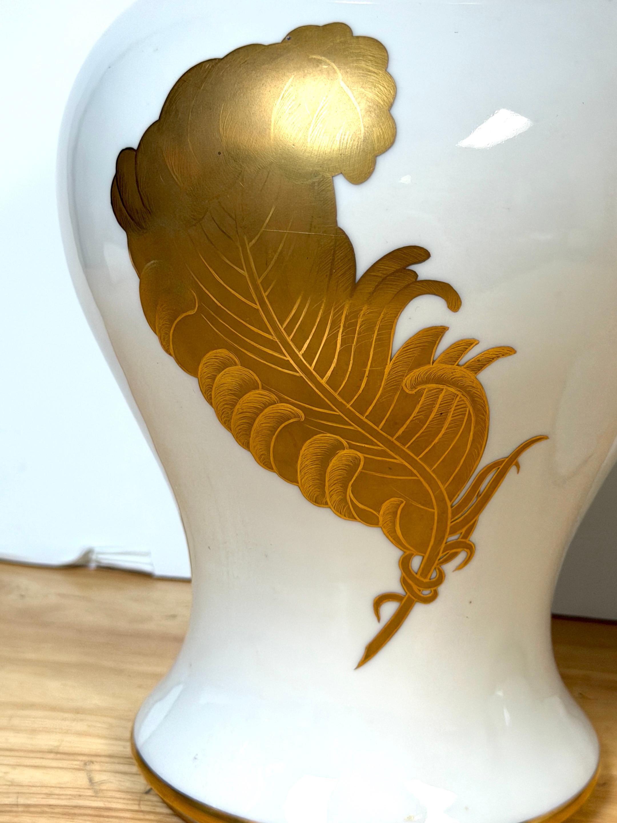 French Pair Maison Jansen Style Porcelaine de Paris Covered Urns Gilt Feather Motif For Sale