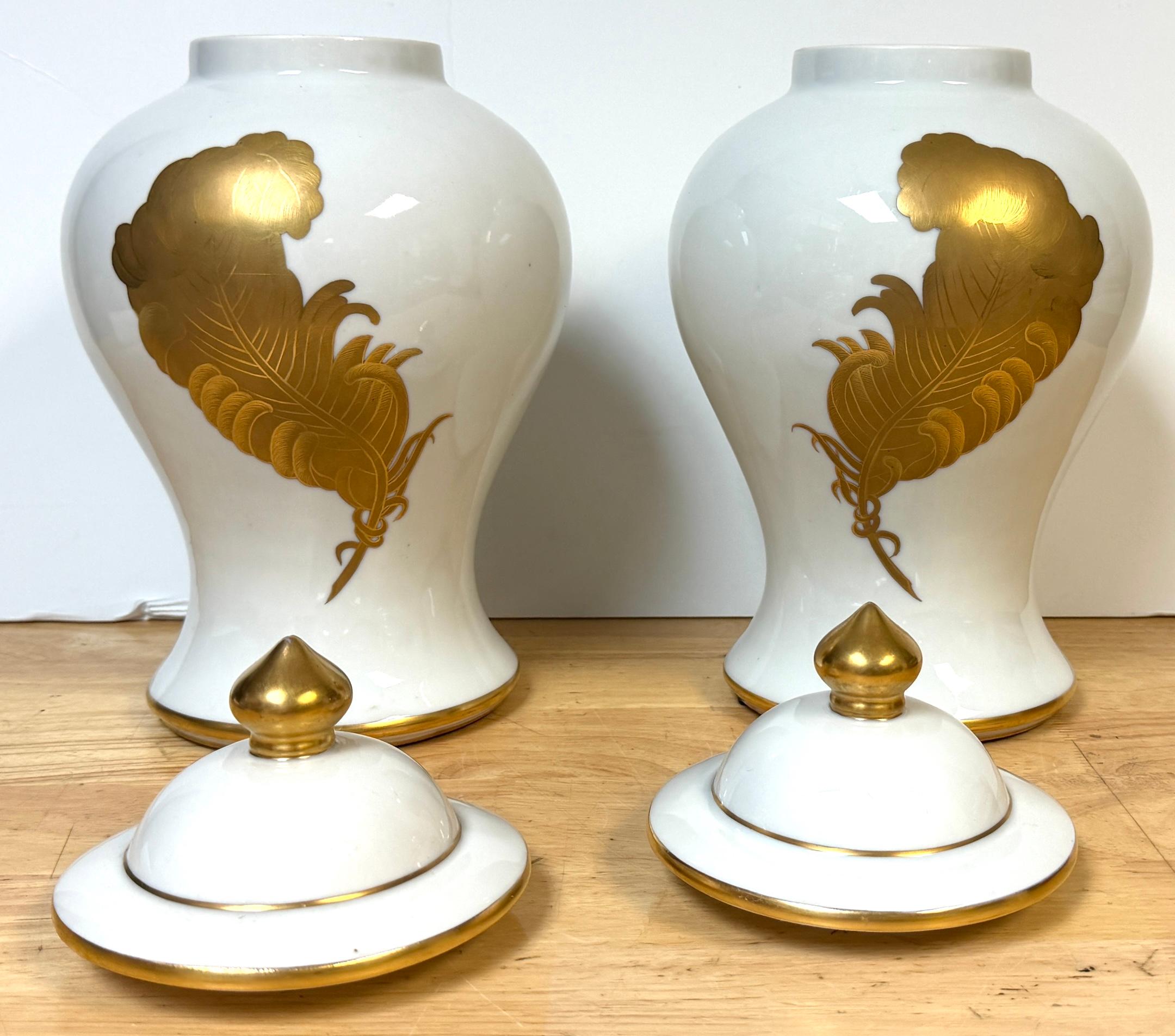 Pair Maison Jansen Style Porcelaine de Paris Covered Urns Gilt Feather Motif For Sale 1