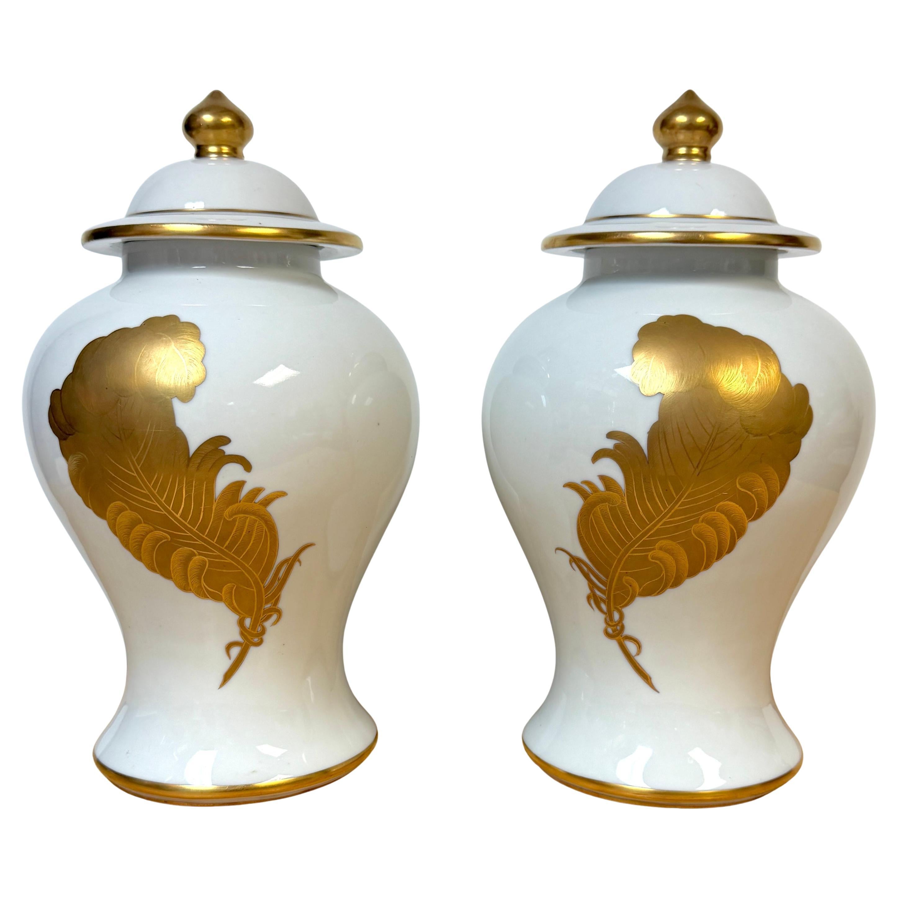 Pair Maison Jansen Style Porcelaine de Paris Covered Urns Gilt Feather Motif For Sale