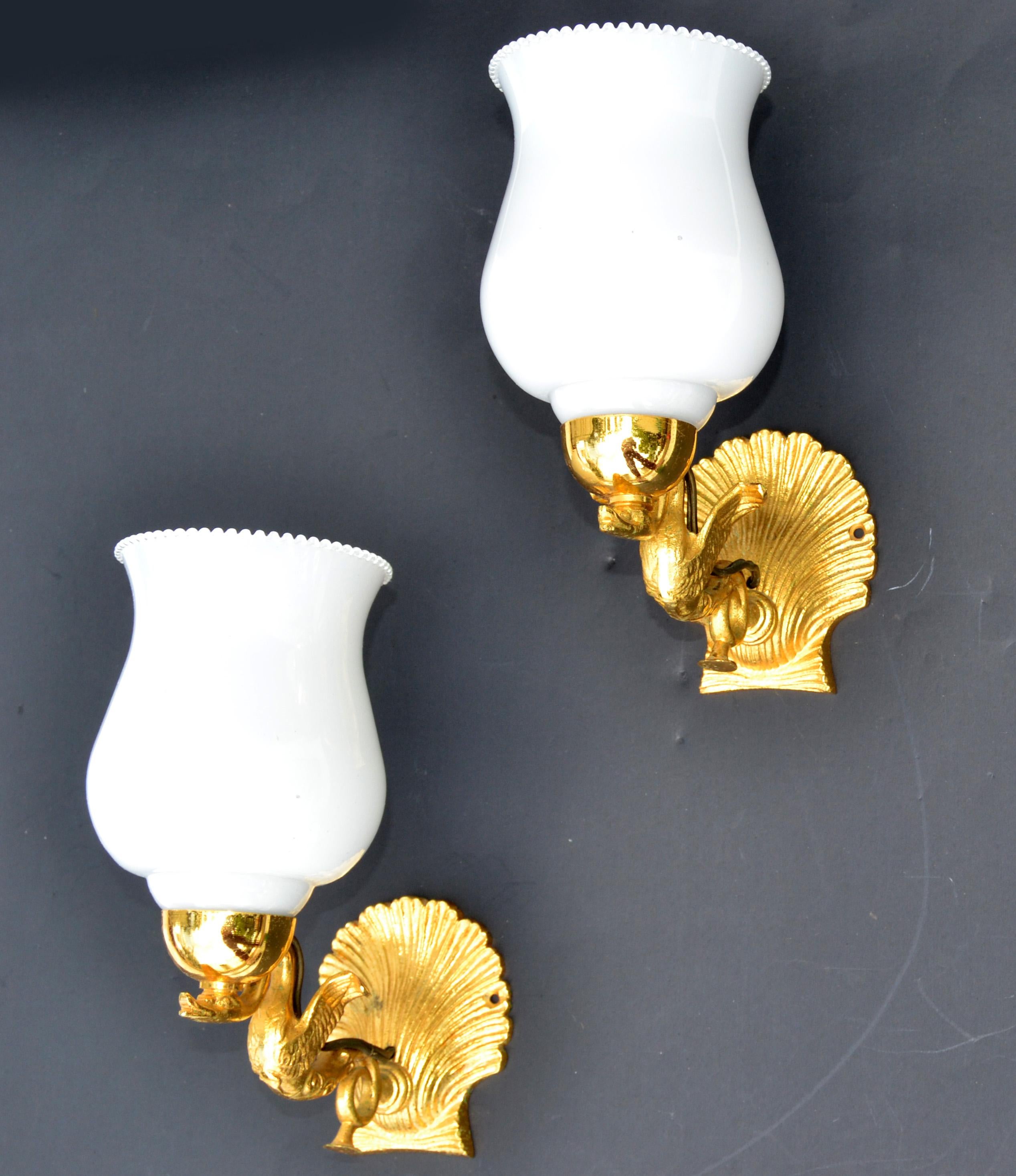 Superb pair of Maison Lancel gilt bronze sconces, wall lights with original white ruffled Opaline glass shade.
These animal sculpture lighting was made in the style of E. Guillemard 1950 in France. 
Perfect working condition and each sconce takes