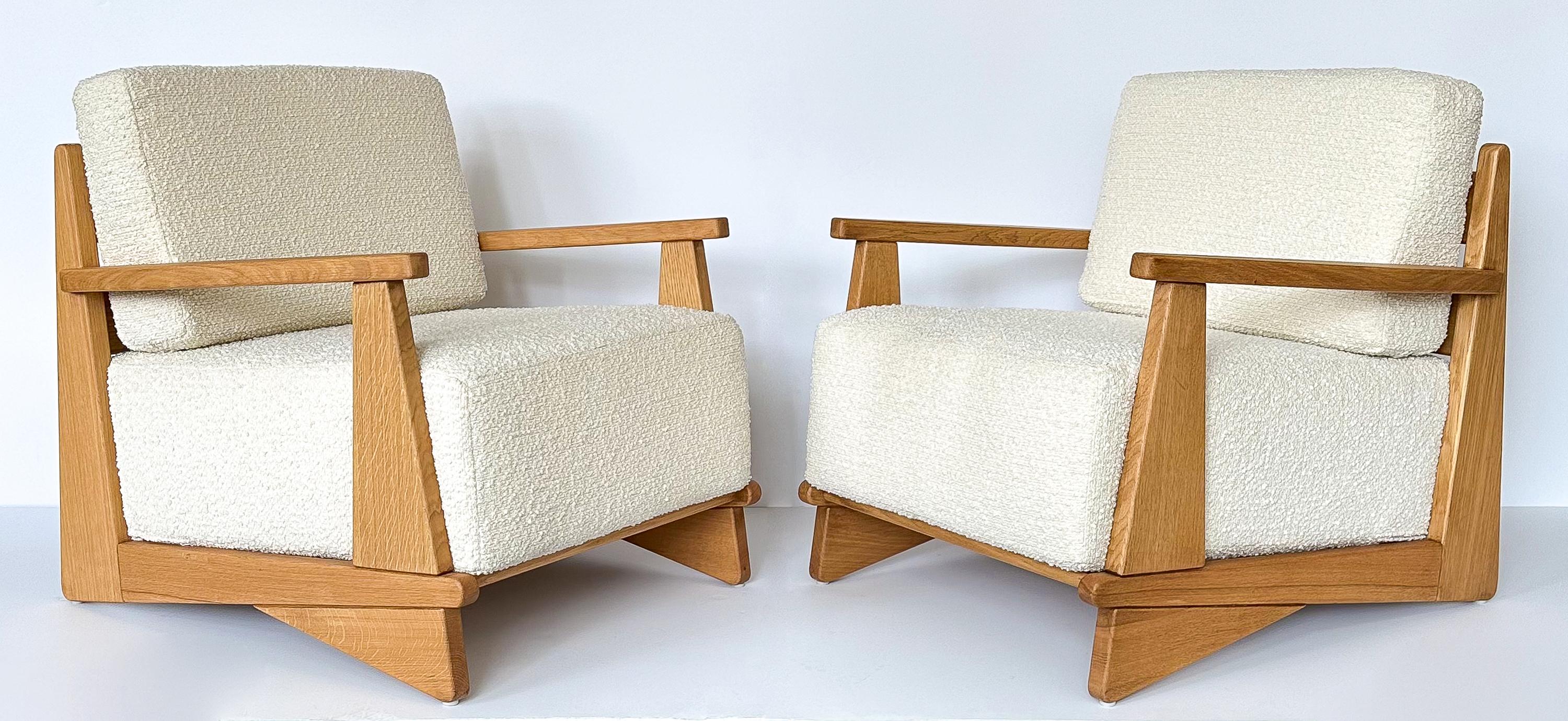 Discover the timeless elegance and exceptional quality of this pair of lounge chairs by Maison Regain, the renowned French furniture atelier. Originating from the Haute-Alpes region of France, an area abundant with elm trees, Maison Regain created
