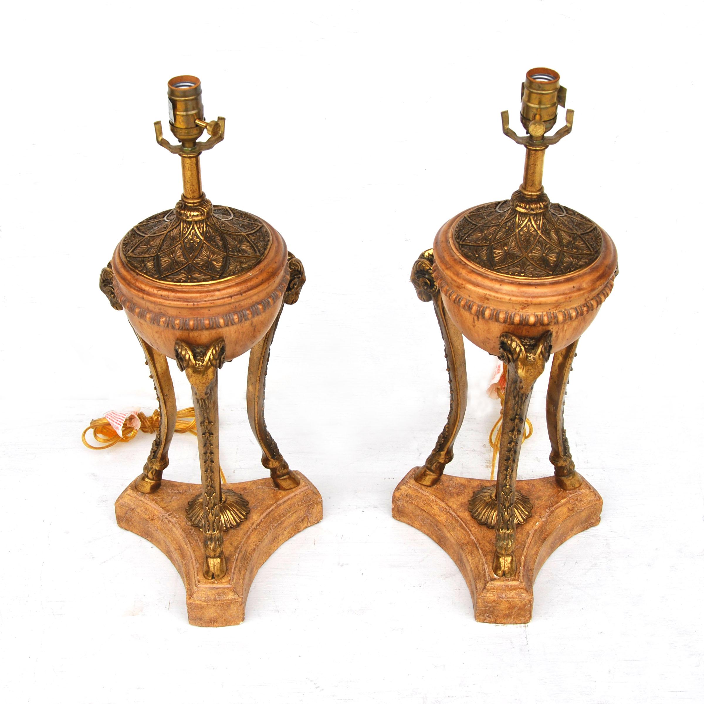 Maitland-Smith

Pair of Maitland-Smith neoclassical ram head table lamps
Urn style carved wood lamps with gold details.

       