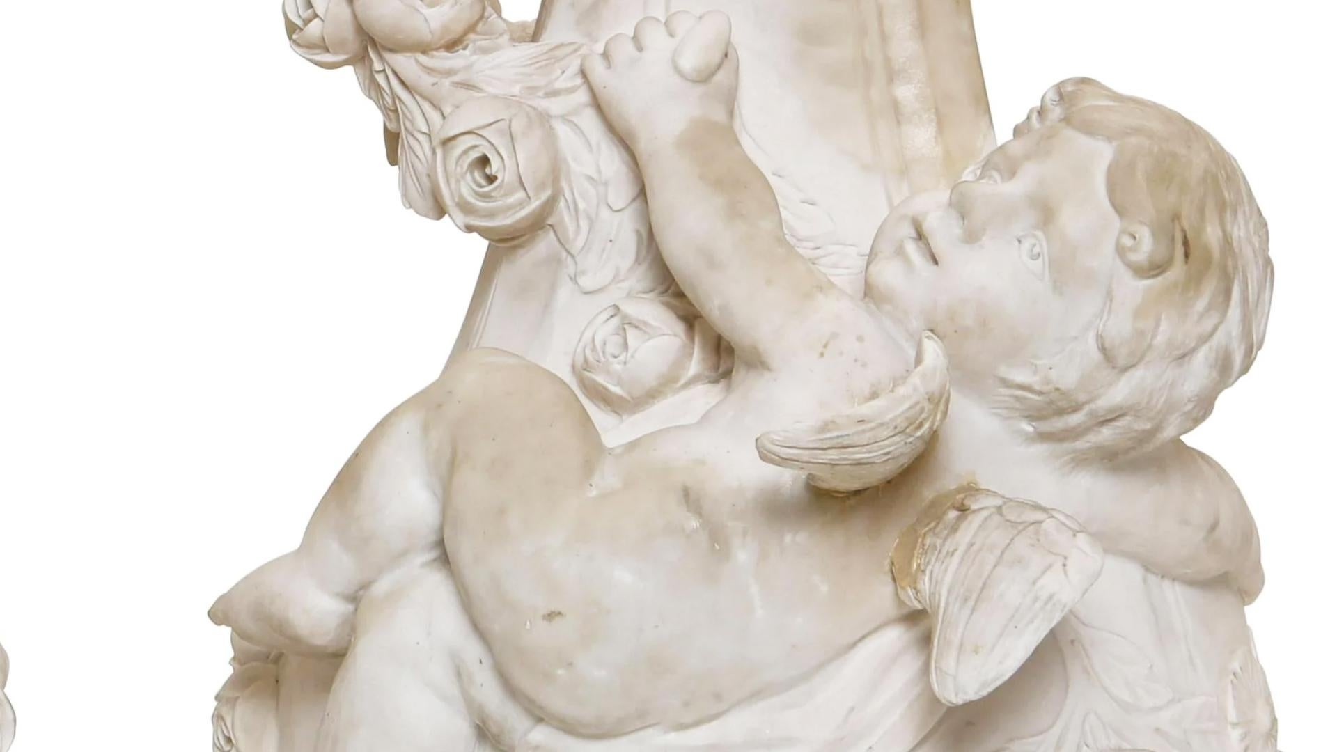 Hand-Carved Pair of Marble Urns with Cherubs, Signed A. Moreau