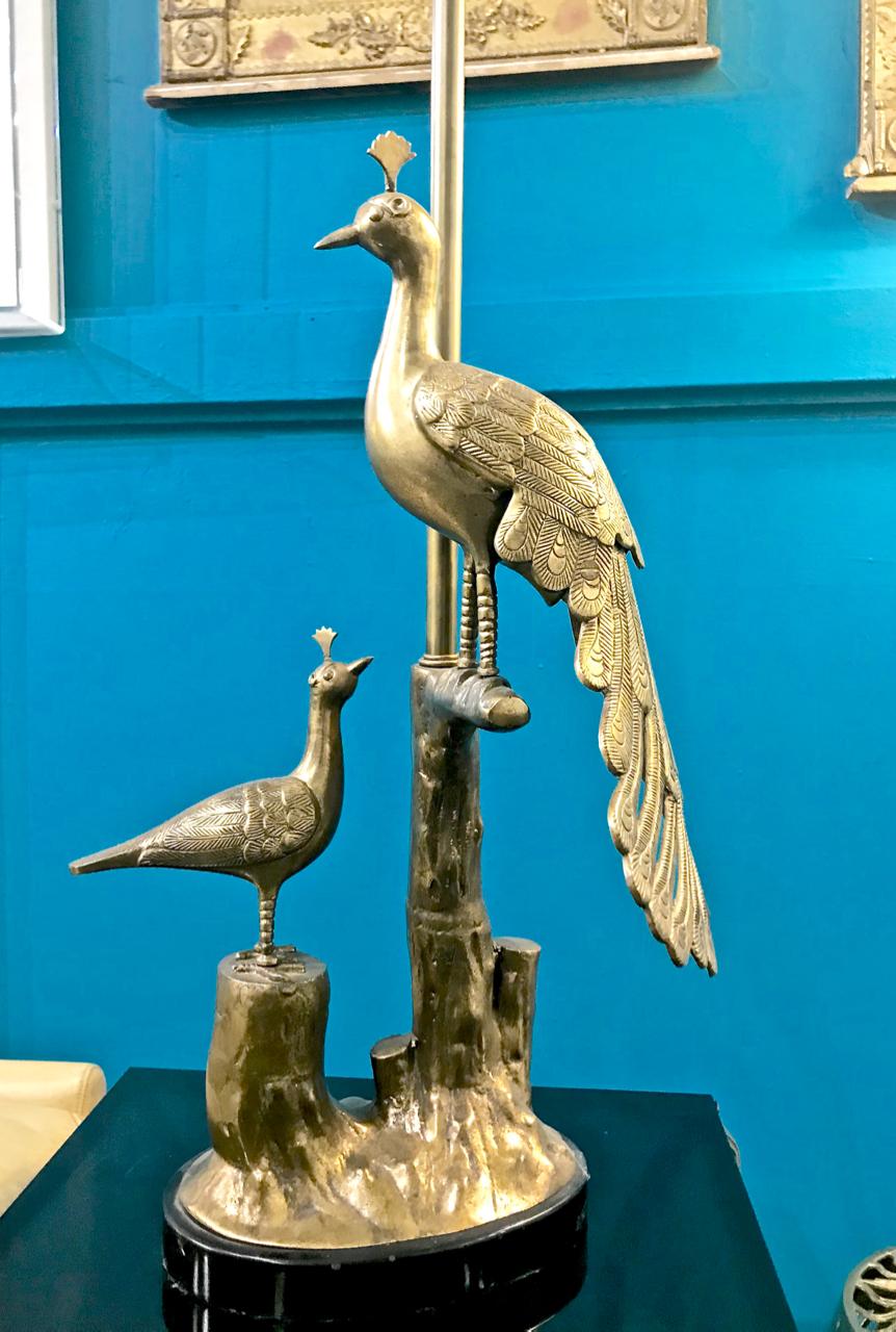 This is a great pair of Marbro solid brass peacock and chick table lamps that date to the early 1960s. The casting of the bronze peacock elements is of high quality and both lamps are in very good overall condition with natural patina. There are