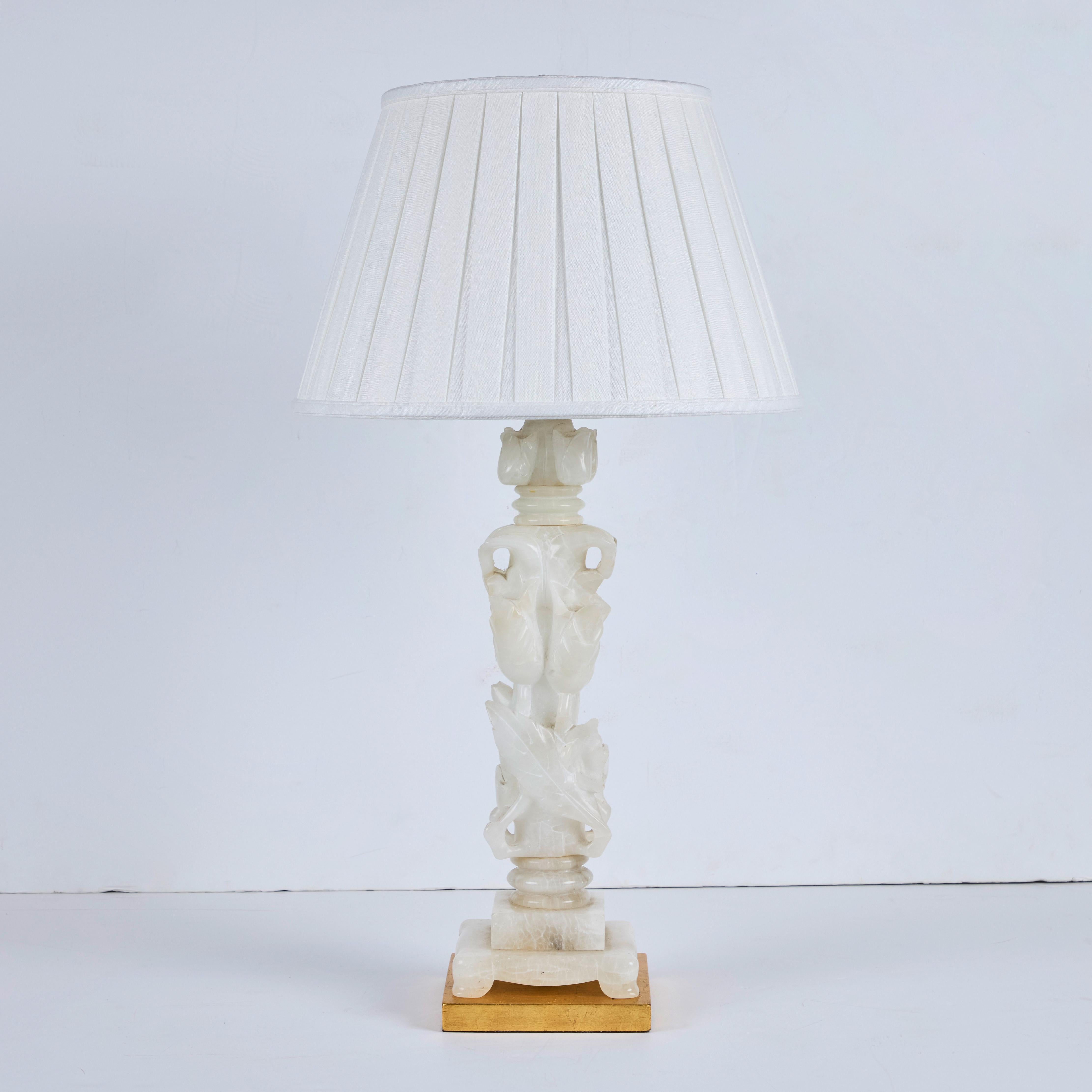 A left/right pair of Marbro Lamp Company lamps featuring hand carved in Italy, alabaster bases.  USA Circa 1950’s.
New pleated linen shades.  Shade: 16”Diameter
