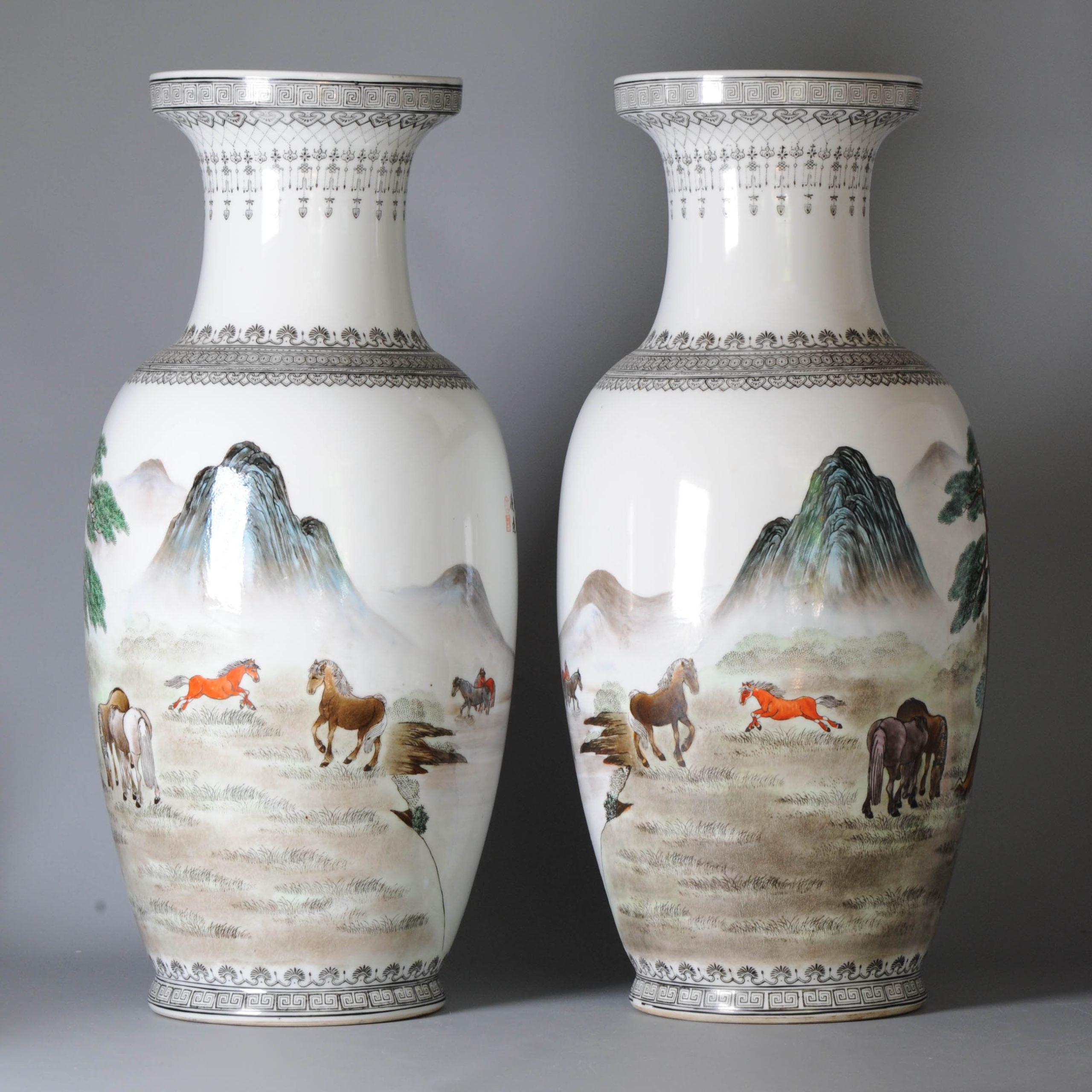 A very nicely decorated pair of vases from the PROC period. Each Vase decorated with with a scene of horses in a mountain landscape.

Both marked with a seal mark at the base.

Condition
Overall Condition Perfect. Size: approx. 460x200mm