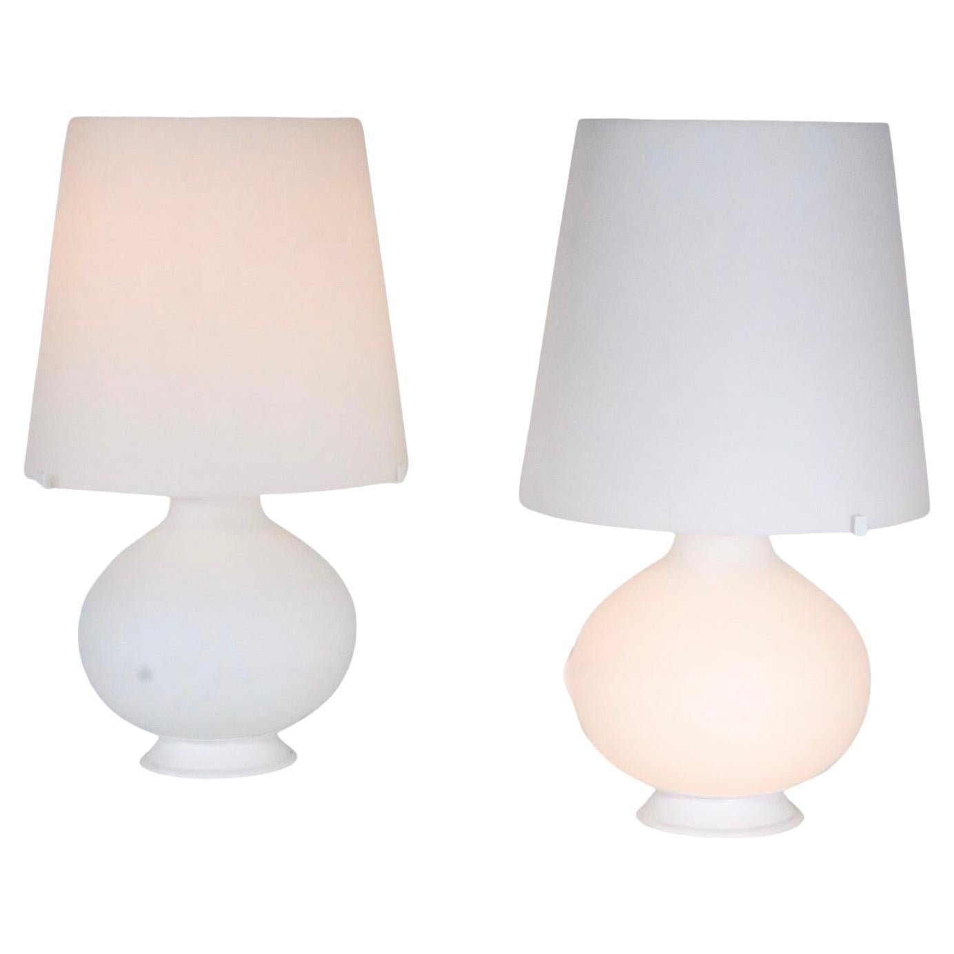 Exquisite pair of Max Ingrand design for Fontana Arte frosted glass table lamps, model 1853. Originally designed in the Mid 20th C, these are later reissues, made by Fontana Arte circa 1990/ 2010. The lamps feature frosted white glass bodies and
