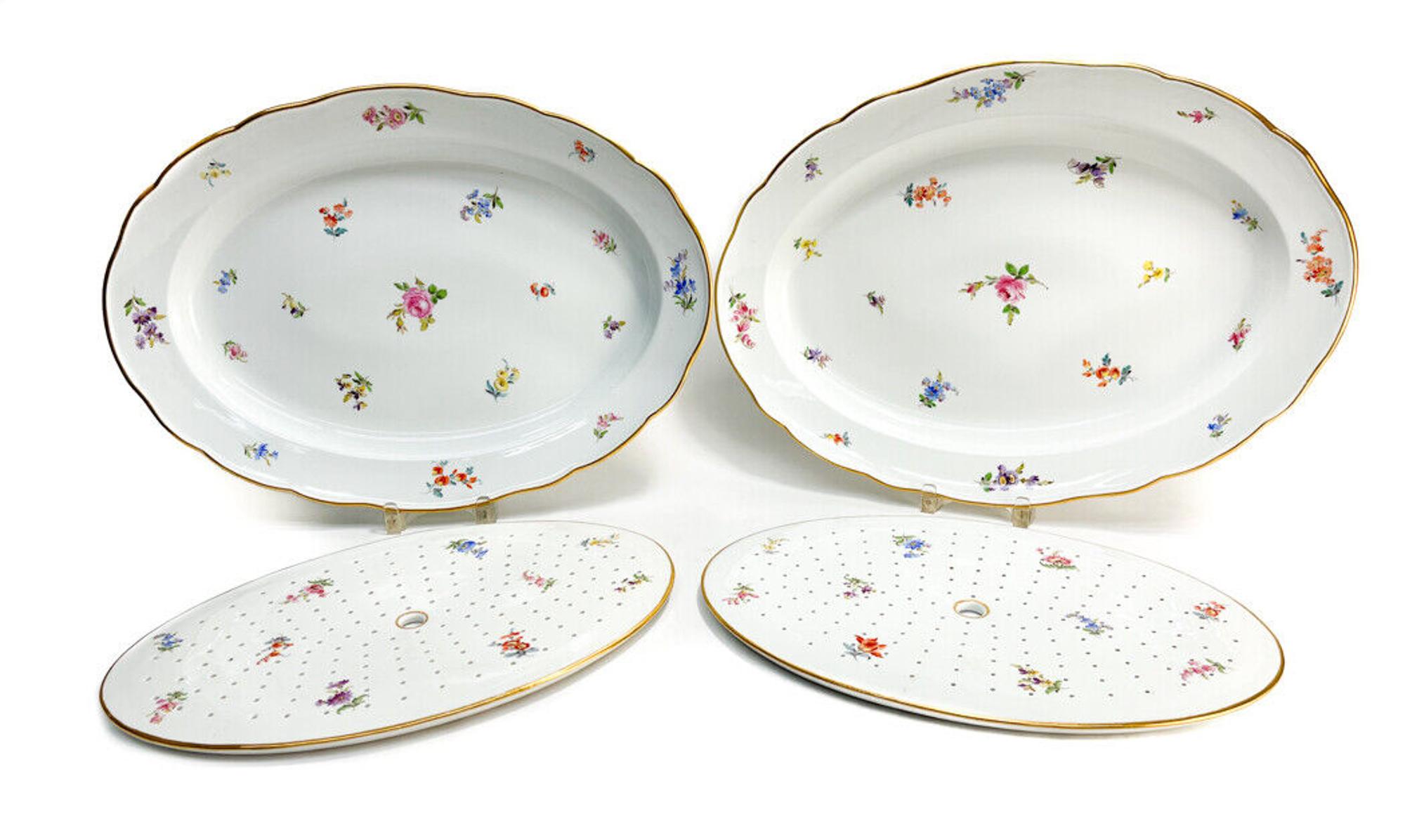 Pair Meissen Germany Porcelain Serving Entrée Dishes. Hand painted scattered florals throughout. With an insert strainer to each tray. Meissen marks to the underside.

Additional Information: 
Type: Serving Entrée Dishes
Weight Approx., 16