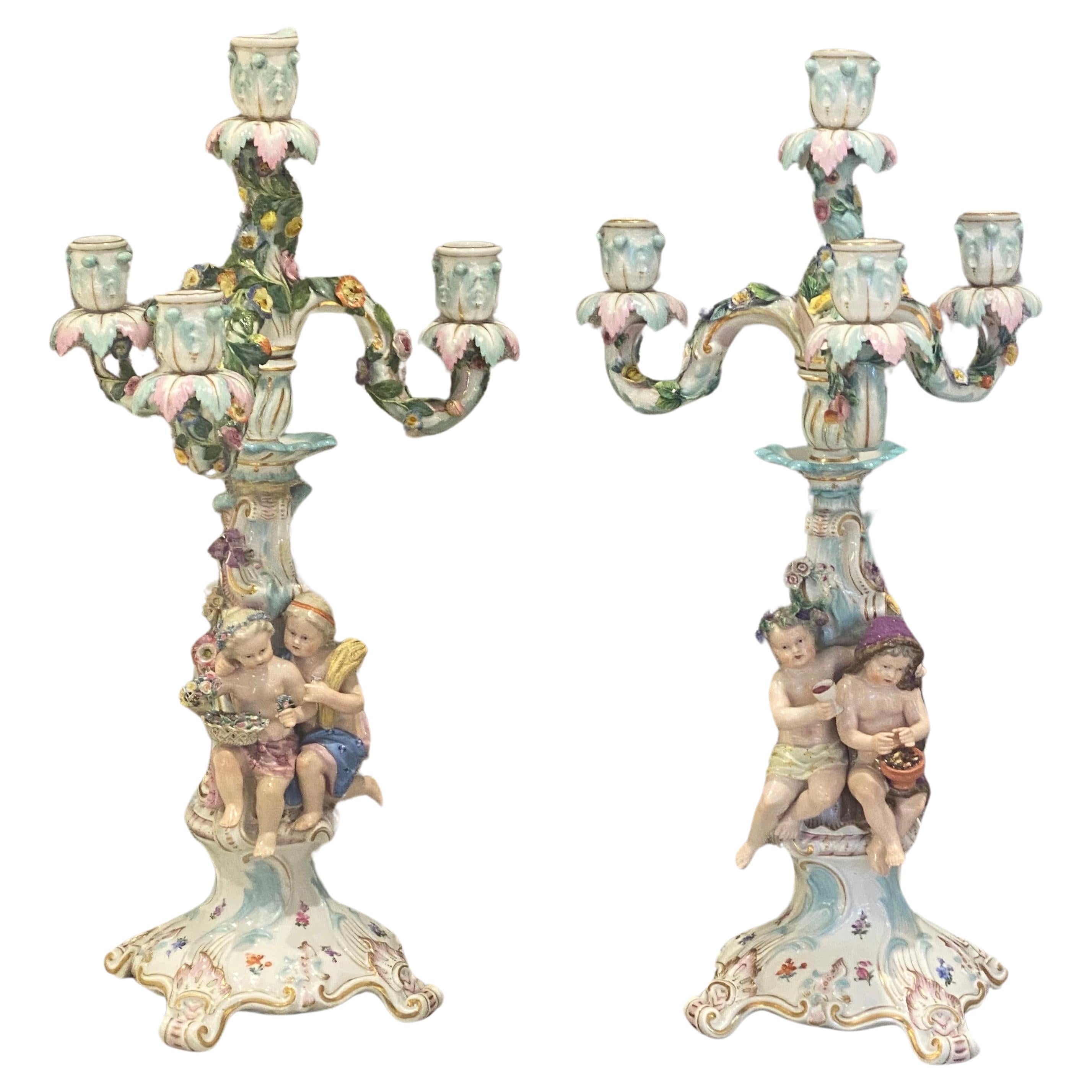 Great Detail on these very Fine Hand Painted Meissen Porcelain Candelabras.
Two children on each 'Summer' and 'Fall' holding and the harvest and grapes.
 Enhanced with floral and fruit encrusted decoration,
When the top part is off they becomes a