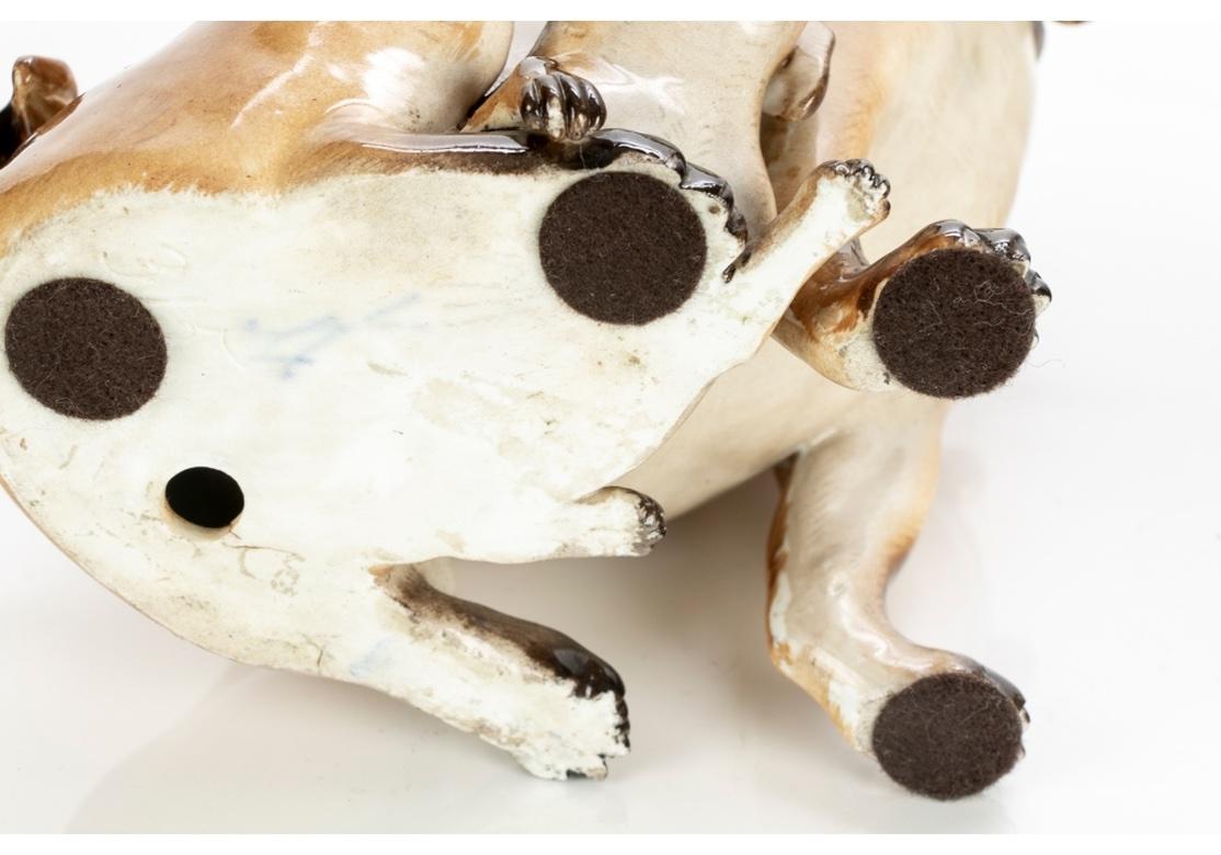 Regency Pair Meissen Porcelain Pug Dog Figures With Pup After J.J.Kaendler For Sale
