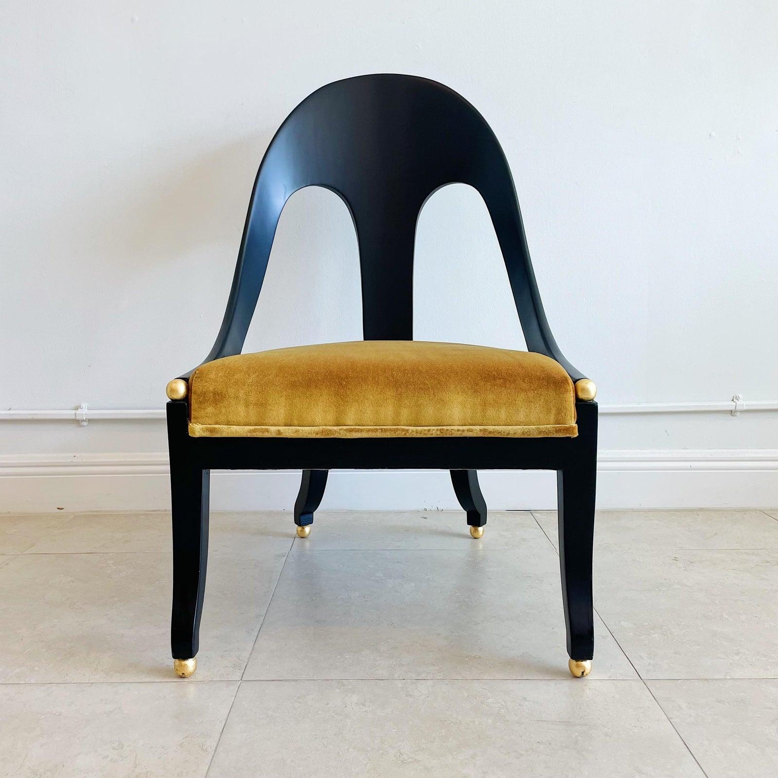 Delightful pair of slipper chairs by Michael Taylor for Baker Furniture Company. Newly refinished in 25% matte black lacquer with gold leaf accent balls on the feet and end of the arm rests. Recently upholstered in Mustard velvet over new foam and
