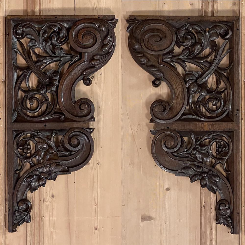 Pair mid-19th century French Renaissance carved architectural decorations are a marvel of the sculptor's art! The intricate naturalistic form features bold scrollwork, grapevines, burgeoning flowers and glorious acanthus leaves in multiple forms.