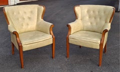 Pair Mid 20th Century Mahogany and Tufted Vinyl Upholstered Wingback Chairs