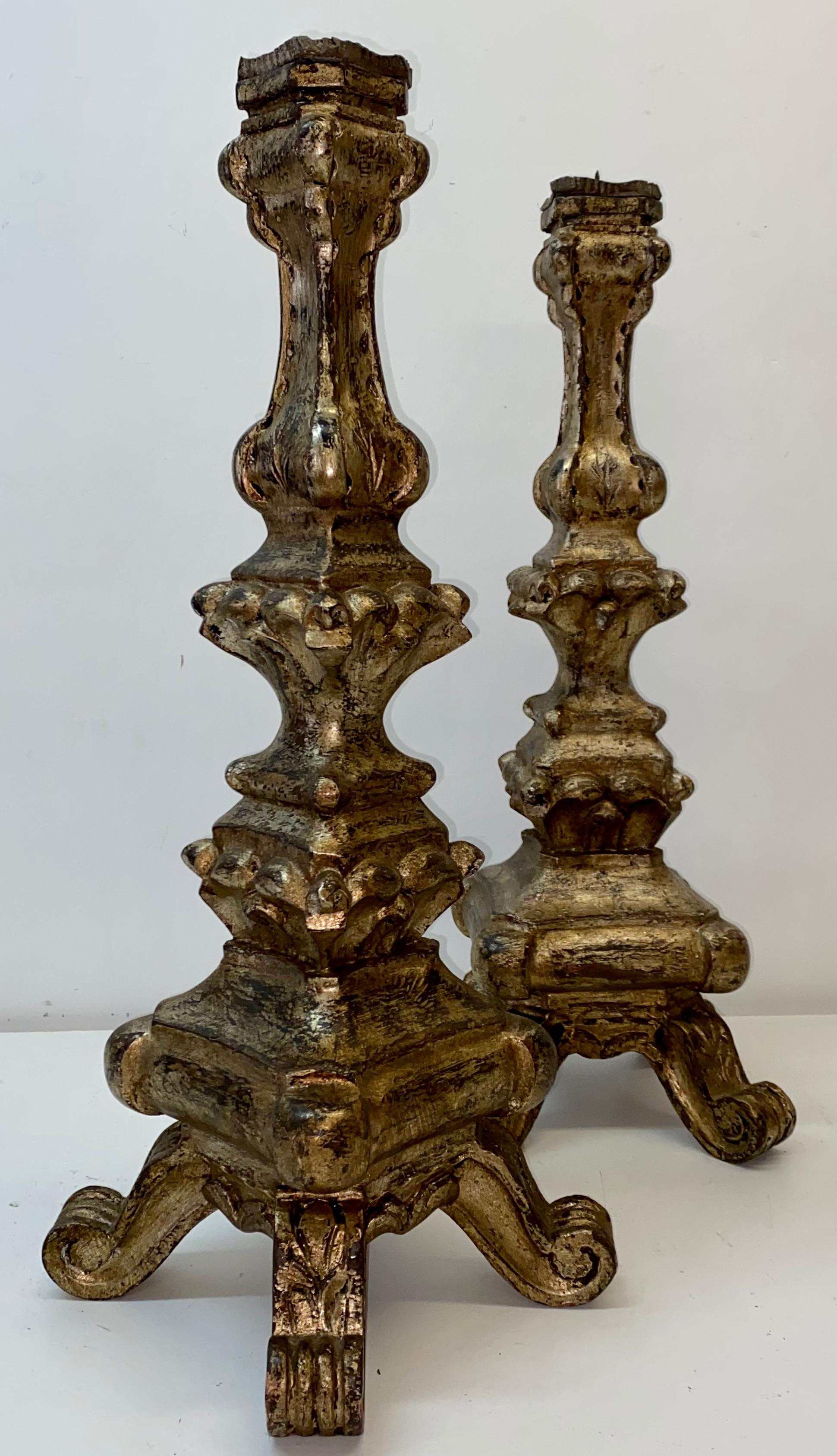 Pair mid 20th century Venetian style carved silver tone gilt wood prickets

Beautifully hand carved candle holders

Gilt finish with a rich patina and slightly silvered tone

Measures: 10