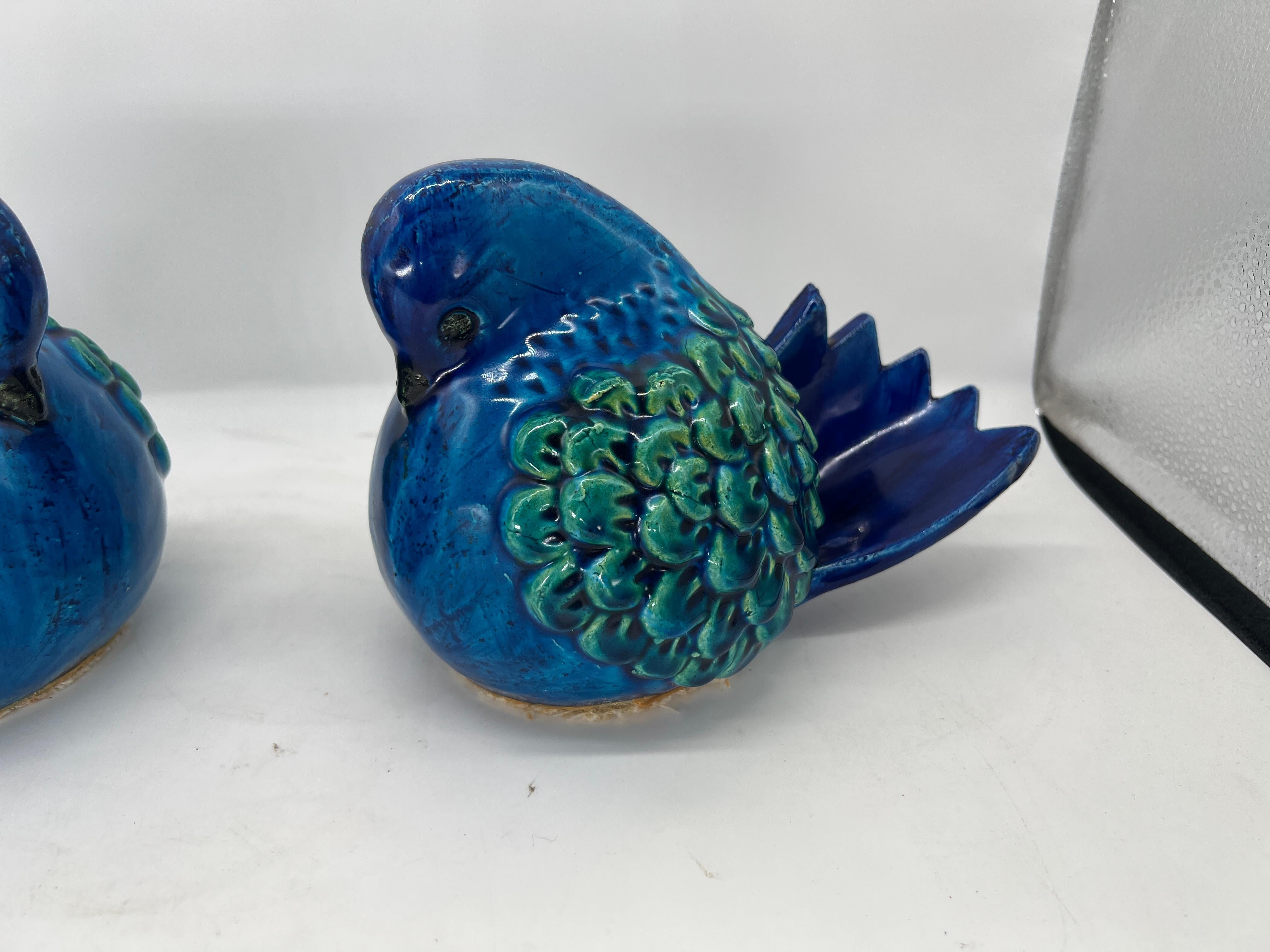 Pair of Aldo Londi for Bitossi
Rimini Blu Bird Sculptures
Mid-Century, c. 1960s

This exquisite pair of ceramic bird sculptures by Aldo Londi for Bitossi represents the quintessential charm of the Rimini Blu collection, an iconic series of