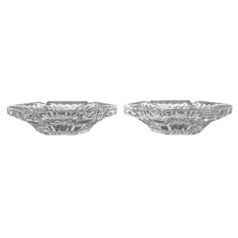 Elevate your smoking experience with this exquisite pair of Mid-Century Baccarat Hexagonal Crystal Cigar Ashtrays. Meticulously crafted, each ashtray is a testament to the artistry and precision that defines Baccarat crystal. The unique hexagonal