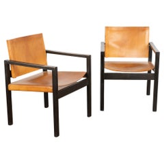 Pair Mid Century Brown Leather Arm Chairs on Black Wood Frame Denmark circa 1960